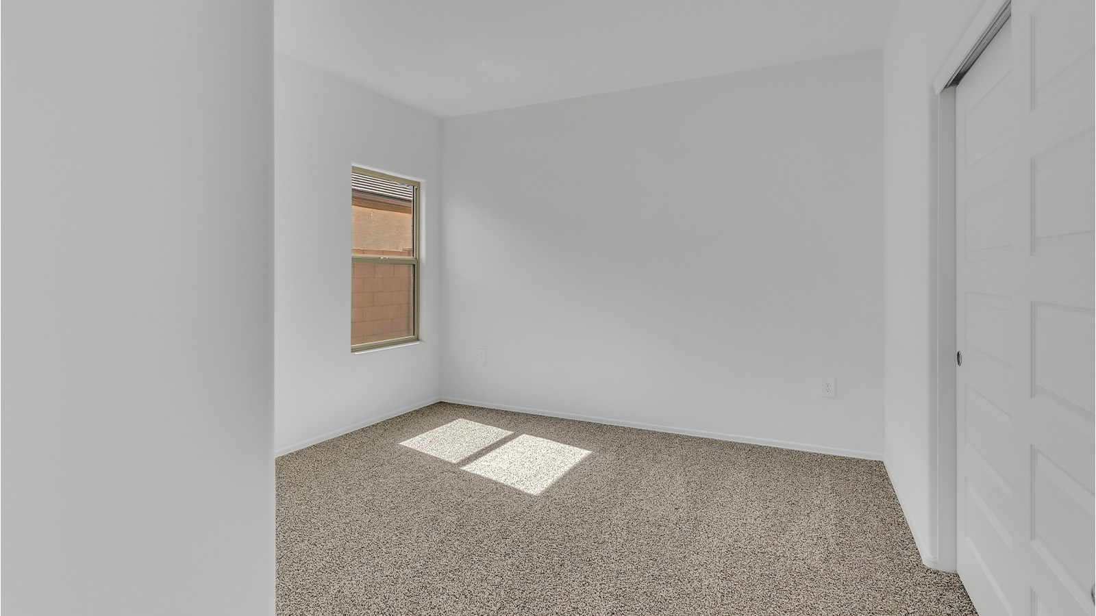 Welcome to The Citrine, a spacious single-story new home located in the tranquil Cholla Ridge neighborhood of Saguaro Bloom. With 2,577 square feet of well-planned living space, this home offers four bedrooms, three bathrooms, and a dedicated study, making it ideal for families who value both space and convenience.  As you enter through the inviting covered porch, you’re greeted by a bright and airy entryway that flows into the heart of the home. The expansive great room, dining area, and kitchen are thoughtfully connected, creating an ideal space for entertaining or simply enjoying time with family. The kitchen is a chef's dream, featuring a large island, granite countertops, and Shaker-style cabinetry in double espresso. A spacious pantry and modern stainless steel gas appliances ensure that this kitchen is both functional and stylish.  The Citrine’s layout includes a generously sized primary bedroom, carefully positioned for privacy at the rear of the home. This room features a large walk-in closet and an en-suite bathroom with dual executive-height vanities and a luxurious super shower. The additional three bedrooms are well-sized and located in separate areas of the home, ensuring privacy and easy access to two more full bathrooms.  One of the highlights of The Citrine is its versatile study, which can be used as a home office, library, media room, or extra bedroom depending on your needs. The large laundry room, conveniently situated near the bedrooms, adds to the home’s practicality.  The covered patio, accessible from the great room, offers a perfect spot for outdoor living, where you can enjoy Arizona’s beautiful weather throughout the year. Whether you’re hosting a barbecue or simply relaxing, this outdoor space enhances the home’s appeal.  Designed with energy efficiency and modern living in mind, The Citrine includes eco-friendly features and smart home technology, ensuring comfort and sustainability. Large windows throughout the home allow natural light to brighten every corner, creating a warm and welcoming atmosphere.  Located within the exclusive Cholla Ridge neighborhood at Saguaro Bloom, residents of The Citrine enjoy a range of premium features, including beautiful 12x24” tile flooring, gourmet kitchens, and 10’ ceilings in select homes. The community offers access to two pools, walking trails, parks, and more, all set against the picturesque backdrop of the Tucson Mountains.  The Citrine combines style, comfort, and practicality, making it a perfect place to call home in one of Marana’s most sought-after communities.