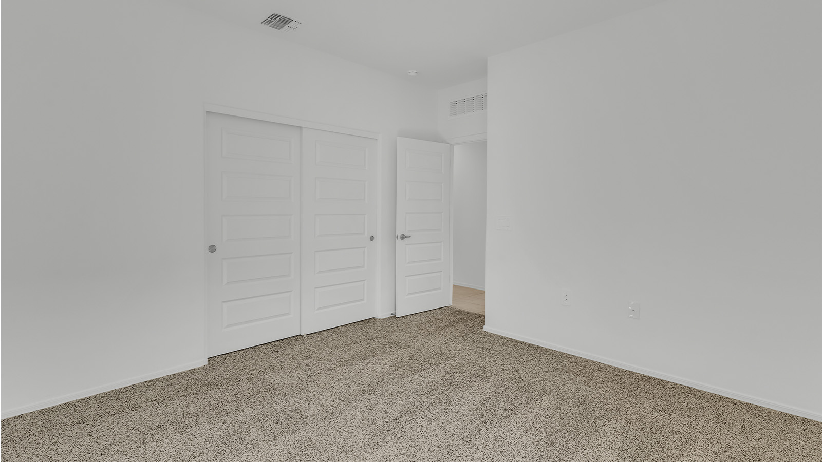 Welcome to The Citrine, a spacious single-story new home located in the tranquil Cholla Ridge neighborhood of Saguaro Bloom. With 2,577 square feet of well-planned living space, this home offers four bedrooms, three bathrooms, and a dedicated study, making it ideal for families who value both space and convenience.  As you enter through the inviting covered porch, you’re greeted by a bright and airy entryway that flows into the heart of the home. The expansive great room, dining area, and kitchen are thoughtfully connected, creating an ideal space for entertaining or simply enjoying time with family. The kitchen is a chef's dream, featuring a large island, granite countertops, and Shaker-style cabinetry in double espresso. A spacious pantry and modern stainless steel gas appliances ensure that this kitchen is both functional and stylish.  The Citrine’s layout includes a generously sized primary bedroom, carefully positioned for privacy at the rear of the home. This room features a large walk-in closet and an en-suite bathroom with dual executive-height vanities and a luxurious super shower. The additional three bedrooms are well-sized and located in separate areas of the home, ensuring privacy and easy access to two more full bathrooms.  One of the highlights of The Citrine is its versatile study, which can be used as a home office, library, media room, or extra bedroom depending on your needs. The large laundry room, conveniently situated near the bedrooms, adds to the home’s practicality.  The covered patio, accessible from the great room, offers a perfect spot for outdoor living, where you can enjoy Arizona’s beautiful weather throughout the year. Whether you’re hosting a barbecue or simply relaxing, this outdoor space enhances the home’s appeal.  Designed with energy efficiency and modern living in mind, The Citrine includes eco-friendly features and smart home technology, ensuring comfort and sustainability. Large windows throughout the home allow natural light to brighten every corner, creating a warm and welcoming atmosphere.  Located within the exclusive Cholla Ridge neighborhood at Saguaro Bloom, residents of The Citrine enjoy a range of premium features, including beautiful 12x24” tile flooring, gourmet kitchens, and 10’ ceilings in select homes. The community offers access to two pools, walking trails, parks, and more, all set against the picturesque backdrop of the Tucson Mountains.  The Citrine combines style, comfort, and practicality, making it a perfect place to call home in one of Marana’s most sought-after communities.