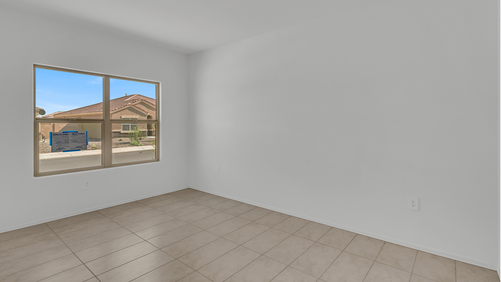 Welcome to The Citrine, a spacious single-story new home located in the tranquil Cholla Ridge neighborhood of Saguaro Bloom. With 2,577 square feet of well-planned living space, this home offers four bedrooms, three bathrooms, and a dedicated study, making it ideal for families who value both space and convenience.  As you enter through the inviting covered porch, you’re greeted by a bright and airy entryway that flows into the heart of the home. The expansive great room, dining area, and kitchen are thoughtfully connected, creating an ideal space for entertaining or simply enjoying time with family. The kitchen is a chef's dream, featuring a large island, granite countertops, and Shaker-style cabinetry in double espresso. A spacious pantry and modern stainless steel gas appliances ensure that this kitchen is both functional and stylish.  The Citrine’s layout includes a generously sized primary bedroom, carefully positioned for privacy at the rear of the home. This room features a large walk-in closet and an en-suite bathroom with dual executive-height vanities and a luxurious super shower. The additional three bedrooms are well-sized and located in separate areas of the home, ensuring privacy and easy access to two more full bathrooms.  One of the highlights of The Citrine is its versatile study, which can be used as a home office, library, media room, or extra bedroom depending on your needs. The large laundry room, conveniently situated near the bedrooms, adds to the home’s practicality.  The covered patio, accessible from the great room, offers a perfect spot for outdoor living, where you can enjoy Arizona’s beautiful weather throughout the year. Whether you’re hosting a barbecue or simply relaxing, this outdoor space enhances the home’s appeal.  Designed with energy efficiency and modern living in mind, The Citrine includes eco-friendly features and smart home technology, ensuring comfort and sustainability. Large windows throughout the home allow natural light to brighten every corner, creating a warm and welcoming atmosphere.  Located within the exclusive Cholla Ridge neighborhood at Saguaro Bloom, residents of The Citrine enjoy a range of premium features, including beautiful 12x24” tile flooring, gourmet kitchens, and 10’ ceilings in select homes. The community offers access to two pools, walking trails, parks, and more, all set against the picturesque backdrop of the Tucson Mountains.  The Citrine combines style, comfort, and practicality, making it a perfect place to call home in one of Marana’s most sought-after communities.