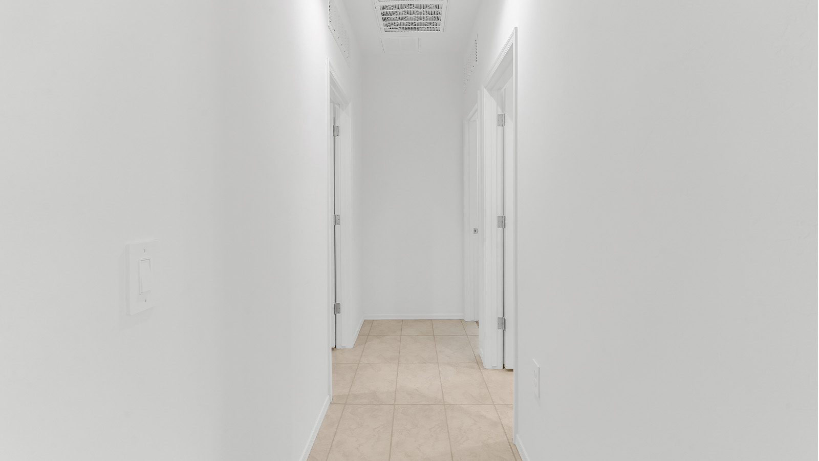 Welcome to The Citrine, a spacious single-story new home located in the tranquil Cholla Ridge neighborhood of Saguaro Bloom. With 2,577 square feet of well-planned living space, this home offers four bedrooms, three bathrooms, and a dedicated study, making it ideal for families who value both space and convenience.  As you enter through the inviting covered porch, you’re greeted by a bright and airy entryway that flows into the heart of the home. The expansive great room, dining area, and kitchen are thoughtfully connected, creating an ideal space for entertaining or simply enjoying time with family. The kitchen is a chef's dream, featuring a large island, granite countertops, and Shaker-style cabinetry in double espresso. A spacious pantry and modern stainless steel gas appliances ensure that this kitchen is both functional and stylish.  The Citrine’s layout includes a generously sized primary bedroom, carefully positioned for privacy at the rear of the home. This room features a large walk-in closet and an en-suite bathroom with dual executive-height vanities and a luxurious super shower. The additional three bedrooms are well-sized and located in separate areas of the home, ensuring privacy and easy access to two more full bathrooms.  One of the highlights of The Citrine is its versatile study, which can be used as a home office, library, media room, or extra bedroom depending on your needs. The large laundry room, conveniently situated near the bedrooms, adds to the home’s practicality.  The covered patio, accessible from the great room, offers a perfect spot for outdoor living, where you can enjoy Arizona’s beautiful weather throughout the year. Whether you’re hosting a barbecue or simply relaxing, this outdoor space enhances the home’s appeal.  Designed with energy efficiency and modern living in mind, The Citrine includes eco-friendly features and smart home technology, ensuring comfort and sustainability. Large windows throughout the home allow natural light to brighten every corner, creating a warm and welcoming atmosphere.  Located within the exclusive Cholla Ridge neighborhood at Saguaro Bloom, residents of The Citrine enjoy a range of premium features, including beautiful 12x24” tile flooring, gourmet kitchens, and 10’ ceilings in select homes. The community offers access to two pools, walking trails, parks, and more, all set against the picturesque backdrop of the Tucson Mountains.  The Citrine combines style, comfort, and practicality, making it a perfect place to call home in one of Marana’s most sought-after communities.