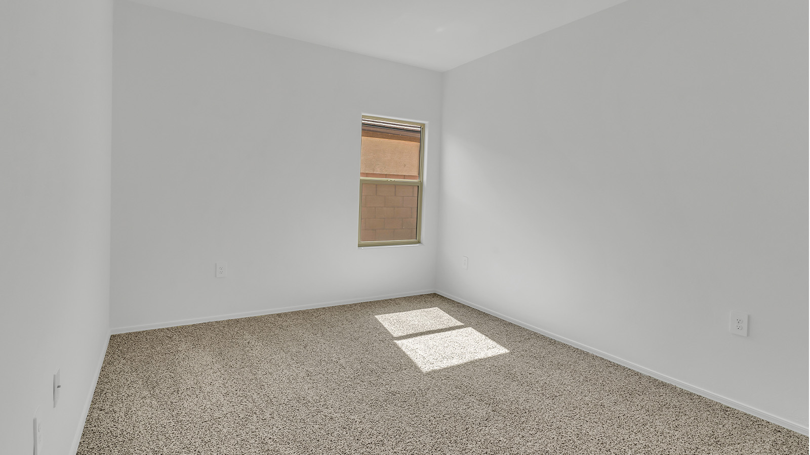 Welcome to The Citrine, a spacious single-story new home located in the tranquil Cholla Ridge neighborhood of Saguaro Bloom. With 2,577 square feet of well-planned living space, this home offers four bedrooms, three bathrooms, and a dedicated study, making it ideal for families who value both space and convenience.  As you enter through the inviting covered porch, you’re greeted by a bright and airy entryway that flows into the heart of the home. The expansive great room, dining area, and kitchen are thoughtfully connected, creating an ideal space for entertaining or simply enjoying time with family. The kitchen is a chef's dream, featuring a large island, granite countertops, and Shaker-style cabinetry in double espresso. A spacious pantry and modern stainless steel gas appliances ensure that this kitchen is both functional and stylish.  The Citrine’s layout includes a generously sized primary bedroom, carefully positioned for privacy at the rear of the home. This room features a large walk-in closet and an en-suite bathroom with dual executive-height vanities and a luxurious super shower. The additional three bedrooms are well-sized and located in separate areas of the home, ensuring privacy and easy access to two more full bathrooms.  One of the highlights of The Citrine is its versatile study, which can be used as a home office, library, media room, or extra bedroom depending on your needs. The large laundry room, conveniently situated near the bedrooms, adds to the home’s practicality.  The covered patio, accessible from the great room, offers a perfect spot for outdoor living, where you can enjoy Arizona’s beautiful weather throughout the year. Whether you’re hosting a barbecue or simply relaxing, this outdoor space enhances the home’s appeal.  Designed with energy efficiency and modern living in mind, The Citrine includes eco-friendly features and smart home technology, ensuring comfort and sustainability. Large windows throughout the home allow natural light to brighten every corner, creating a warm and welcoming atmosphere.  Located within the exclusive Cholla Ridge neighborhood at Saguaro Bloom, residents of The Citrine enjoy a range of premium features, including beautiful 12x24” tile flooring, gourmet kitchens, and 10’ ceilings in select homes. The community offers access to two pools, walking trails, parks, and more, all set against the picturesque backdrop of the Tucson Mountains.  The Citrine combines style, comfort, and practicality, making it a perfect place to call home in one of Marana’s most sought-after communities.