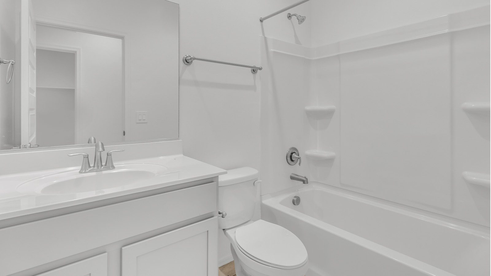 Welcome to The Citrine, a spacious single-story new home located in the tranquil Cholla Ridge neighborhood of Saguaro Bloom. With 2,577 square feet of well-planned living space, this home offers four bedrooms, three bathrooms, and a dedicated study, making it ideal for families who value both space and convenience.  As you enter through the inviting covered porch, you’re greeted by a bright and airy entryway that flows into the heart of the home. The expansive great room, dining area, and kitchen are thoughtfully connected, creating an ideal space for entertaining or simply enjoying time with family. The kitchen is a chef's dream, featuring a large island, granite countertops, and Shaker-style cabinetry in double espresso. A spacious pantry and modern stainless steel gas appliances ensure that this kitchen is both functional and stylish.  The Citrine’s layout includes a generously sized primary bedroom, carefully positioned for privacy at the rear of the home. This room features a large walk-in closet and an en-suite bathroom with dual executive-height vanities and a luxurious super shower. The additional three bedrooms are well-sized and located in separate areas of the home, ensuring privacy and easy access to two more full bathrooms.  One of the highlights of The Citrine is its versatile study, which can be used as a home office, library, media room, or extra bedroom depending on your needs. The large laundry room, conveniently situated near the bedrooms, adds to the home’s practicality.  The covered patio, accessible from the great room, offers a perfect spot for outdoor living, where you can enjoy Arizona’s beautiful weather throughout the year. Whether you’re hosting a barbecue or simply relaxing, this outdoor space enhances the home’s appeal.  Designed with energy efficiency and modern living in mind, The Citrine includes eco-friendly features and smart home technology, ensuring comfort and sustainability. Large windows throughout the home allow natural light to brighten every corner, creating a warm and welcoming atmosphere.  Located within the exclusive Cholla Ridge neighborhood at Saguaro Bloom, residents of The Citrine enjoy a range of premium features, including beautiful 12x24” tile flooring, gourmet kitchens, and 10’ ceilings in select homes. The community offers access to two pools, walking trails, parks, and more, all set against the picturesque backdrop of the Tucson Mountains.  The Citrine combines style, comfort, and practicality, making it a perfect place to call home in one of Marana’s most sought-after communities.