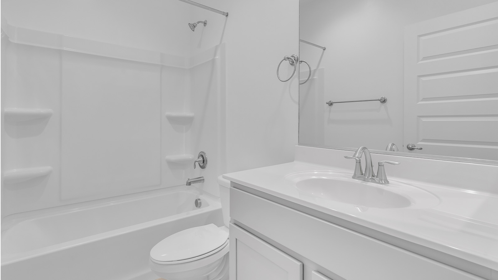 Welcome to The Citrine, a spacious single-story new home located in the tranquil Cholla Ridge neighborhood of Saguaro Bloom. With 2,577 square feet of well-planned living space, this home offers four bedrooms, three bathrooms, and a dedicated study, making it ideal for families who value both space and convenience.  As you enter through the inviting covered porch, you’re greeted by a bright and airy entryway that flows into the heart of the home. The expansive great room, dining area, and kitchen are thoughtfully connected, creating an ideal space for entertaining or simply enjoying time with family. The kitchen is a chef's dream, featuring a large island, granite countertops, and Shaker-style cabinetry in double espresso. A spacious pantry and modern stainless steel gas appliances ensure that this kitchen is both functional and stylish.  The Citrine’s layout includes a generously sized primary bedroom, carefully positioned for privacy at the rear of the home. This room features a large walk-in closet and an en-suite bathroom with dual executive-height vanities and a luxurious super shower. The additional three bedrooms are well-sized and located in separate areas of the home, ensuring privacy and easy access to two more full bathrooms.  One of the highlights of The Citrine is its versatile study, which can be used as a home office, library, media room, or extra bedroom depending on your needs. The large laundry room, conveniently situated near the bedrooms, adds to the home’s practicality.  The covered patio, accessible from the great room, offers a perfect spot for outdoor living, where you can enjoy Arizona’s beautiful weather throughout the year. Whether you’re hosting a barbecue or simply relaxing, this outdoor space enhances the home’s appeal.  Designed with energy efficiency and modern living in mind, The Citrine includes eco-friendly features and smart home technology, ensuring comfort and sustainability. Large windows throughout the home allow natural light to brighten every corner, creating a warm and welcoming atmosphere.  Located within the exclusive Cholla Ridge neighborhood at Saguaro Bloom, residents of The Citrine enjoy a range of premium features, including beautiful 12x24” tile flooring, gourmet kitchens, and 10’ ceilings in select homes. The community offers access to two pools, walking trails, parks, and more, all set against the picturesque backdrop of the Tucson Mountains.  The Citrine combines style, comfort, and practicality, making it a perfect place to call home in one of Marana’s most sought-after communities.