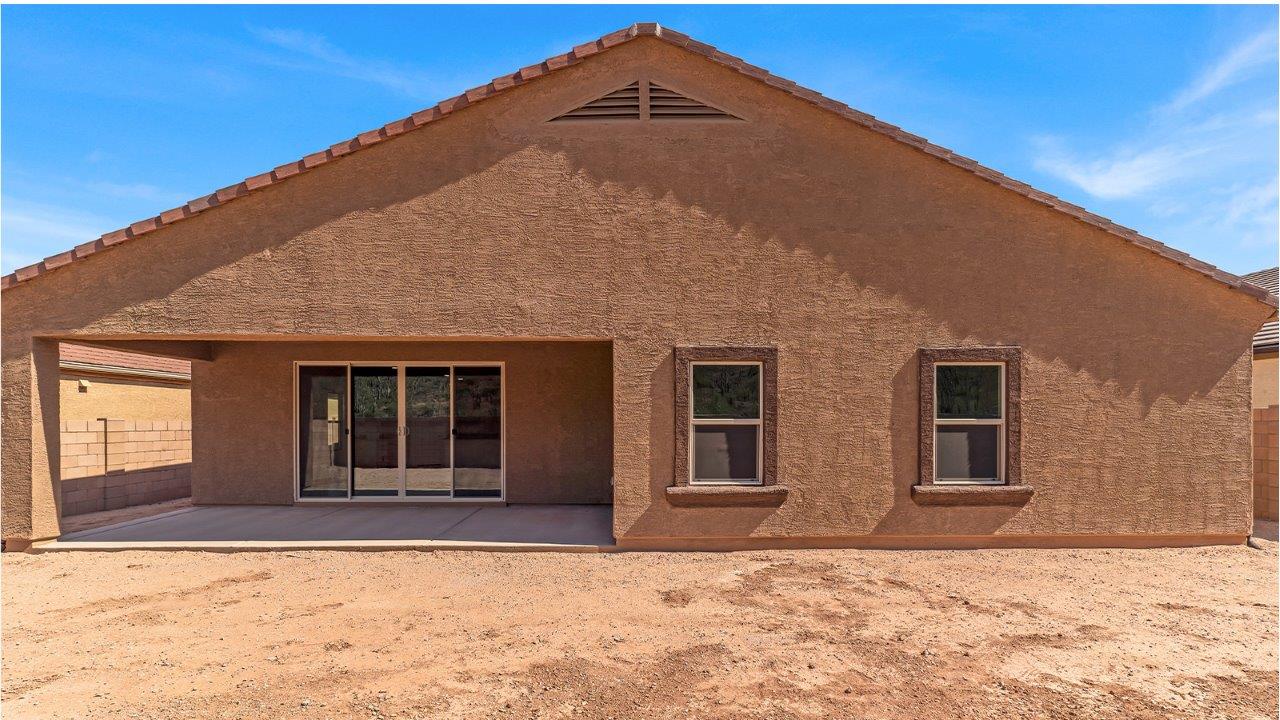 Welcome to The Citrine, a spacious single-story new home located in the tranquil Cholla Ridge neighborhood of Saguaro Bloom. With 2,577 square feet of well-planned living space, this home offers four bedrooms, three bathrooms, and a dedicated study, making it ideal for families who value both space and convenience.  As you enter through the inviting covered porch, you’re greeted by a bright and airy entryway that flows into the heart of the home. The expansive great room, dining area, and kitchen are thoughtfully connected, creating an ideal space for entertaining or simply enjoying time with family. The kitchen is a chef's dream, featuring a large island, granite countertops, and Shaker-style cabinetry in double espresso. A spacious pantry and modern stainless steel gas appliances ensure that this kitchen is both functional and stylish.  The Citrine’s layout includes a generously sized primary bedroom, carefully positioned for privacy at the rear of the home. This room features a large walk-in closet and an en-suite bathroom with dual executive-height vanities and a luxurious super shower. The additional three bedrooms are well-sized and located in separate areas of the home, ensuring privacy and easy access to two more full bathrooms.  One of the highlights of The Citrine is its versatile study, which can be used as a home office, library, media room, or extra bedroom depending on your needs. The large laundry room, conveniently situated near the bedrooms, adds to the home’s practicality.  The covered patio, accessible from the great room, offers a perfect spot for outdoor living, where you can enjoy Arizona’s beautiful weather throughout the year. Whether you’re hosting a barbecue or simply relaxing, this outdoor space enhances the home’s appeal.  Designed with energy efficiency and modern living in mind, The Citrine includes eco-friendly features and smart home technology, ensuring comfort and sustainability. Large windows throughout the home allow natural light to brighten every corner, creating a warm and welcoming atmosphere.  Located within the exclusive Cholla Ridge neighborhood at Saguaro Bloom, residents of The Citrine enjoy a range of premium features, including beautiful 12x24” tile flooring, gourmet kitchens, and 10’ ceilings in select homes. The community offers access to two pools, walking trails, parks, and more, all set against the picturesque backdrop of the Tucson Mountains.  The Citrine combines style, comfort, and practicality, making it a perfect place to call home in one of Marana’s most sought-after communities.