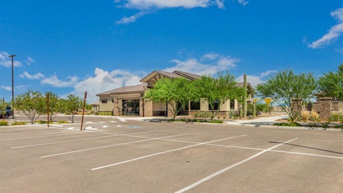 Explore New Homes at Saguaro Bloom by D.R. Horton – A Master-Planned Community in Marana, AZ. Nestled in the foothills of the breathtaking Tucson Mountains, Saguaro Bloom by D.R. Horton is a premier master-planned community in Northwest Marana that offers an exceptional living experience. Saguaro Bloom is divided into distinct neighborhoods, each offering its unique charm and amenities. *Mesquite at Saguaro Bloom* is located in Block 1 and offers a variety of spacious floorplans with 18x18 tile flooring, granite countertops in kitchen and bathrooms, and Shaker-style cabinets in white or gray. These homes feature 9’ ceilings on the first floor, island kitchens, and the Home is Connected® Smart Home package, making them perfect for modern living. *Agave at Saguaro Bloom*, situated in Block 7C, features homes with stunning 6x36” wood-look tile in gray, quartz countertops in kitchen and bathrooms, and Shaker-style cabinets. These homes are designed with stylish interiors and modern conveniences, including LED disc lighting and energy-efficient tankless water heaters. *Cholla Ridge at Saguaro Bloom*, located in Block 7B, offers single-story homes on lots with no rear neighbors. These homes are distinguished by beautiful 12x24” tile flooring, gourmet kitchens, and 10’ ceilings in select homes. With 8’ sliding glass patio doors and super showers, Cholla Ridge combines luxury and privacy in a serene setting. All homes in Saguaro Bloom are built with a Spanish lace stucco exterior, tile roofs, landscaped front yards with auto drip irrigation, and large, fully fenced backyards ready for your design. The homes also include covered front porches and back patios, stainless steel gas appliances, and executive height vanities in all bathrooms. Additionally, as of August 2024, all homes starting production are Zero Energy Ready, meeting rigorous energy efficiency standards that significantly reduce energy costs and environmental impact. Residents of Saguaro Bloom enjoy an array of community amenities, including a clubhouse, two pools with lap lanes and lagoon entry, a fitness center, a splash pad, and over 30 miles of walking trails. The community also features more than 20 pocket parks, playgrounds, and coming soon, a large community park with tennis, pickleball, soccer, baseball, and a dog park. Saguaro Bloom is truly a lifestyle community, offering regular events like Food Truck Thursdays, Movies at the Pool, and holiday decorating contests, all fostering a strong sense of community. Located in the highly-rated Marana Unified School District, Saguaro Bloom is close to excellent schools, including Rattlesnake Ridge Elementary, Marana Middle School, and Marana High School. The community’s location offers a perfect balance of seclusion and convenience, with quick access to I-10, grocery stores, restaurants, and the Twin Peaks Outlet, all within minutes. Downtown Tucson, with its vibrant arts, culture, and entertainment scene, is just a short 15-minute drive away. Surrounded by the natural beauty of the desert landscape, residents can explore nearby outdoor attractions like Saguaro National Park West, the Arizona Desert Museum, and Quarry Pines Golf Course. Whether you enjoy hiking, biking, or simply taking in the stunning views, Saguaro Bloom offers an unparalleled lifestyle in one of Arizona’s most sought-after locations. Discover the perfect blend of modern amenities, scenic beauty, and a strong sense of community at Saguaro Bloom by D.R. Horton – where your new home awaits in Marana, AZ.