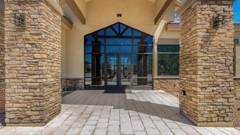 Explore New Homes at Saguaro Bloom by D.R. Horton – A Master-Planned Community in Marana, AZ. Nestled in the foothills of the breathtaking Tucson Mountains, Saguaro Bloom by D.R. Horton is a premier master-planned community in Northwest Marana that offers an exceptional living experience. Saguaro Bloom is divided into distinct neighborhoods, each offering its unique charm and amenities. *Mesquite at Saguaro Bloom* is located in Block 1 and offers a variety of spacious floorplans with 18x18 tile flooring, granite countertops in kitchen and bathrooms, and Shaker-style cabinets in white or gray. These homes feature 9’ ceilings on the first floor, island kitchens, and the Home is Connected® Smart Home package, making them perfect for modern living. *Agave at Saguaro Bloom*, situated in Block 7C, features homes with stunning 6x36” wood-look tile in gray, quartz countertops in kitchen and bathrooms, and Shaker-style cabinets. These homes are designed with stylish interiors and modern conveniences, including LED disc lighting and energy-efficient tankless water heaters. *Cholla Ridge at Saguaro Bloom*, located in Block 7B, offers single-story homes on lots with no rear neighbors. These homes are distinguished by beautiful 12x24” tile flooring, gourmet kitchens, and 10’ ceilings in select homes. With 8’ sliding glass patio doors and super showers, Cholla Ridge combines luxury and privacy in a serene setting. All homes in Saguaro Bloom are built with a Spanish lace stucco exterior, tile roofs, landscaped front yards with auto drip irrigation, and large, fully fenced backyards ready for your design. The homes also include covered front porches and back patios, stainless steel gas appliances, and executive height vanities in all bathrooms. Additionally, as of August 2024, all homes starting production are Zero Energy Ready, meeting rigorous energy efficiency standards that significantly reduce energy costs and environmental impact. Residents of Saguaro Bloom enjoy an array of community amenities, including a clubhouse, two pools with lap lanes and lagoon entry, a fitness center, a splash pad, and over 30 miles of walking trails. The community also features more than 20 pocket parks, playgrounds, and coming soon, a large community park with tennis, pickleball, soccer, baseball, and a dog park. Saguaro Bloom is truly a lifestyle community, offering regular events like Food Truck Thursdays, Movies at the Pool, and holiday decorating contests, all fostering a strong sense of community. Located in the highly-rated Marana Unified School District, Saguaro Bloom is close to excellent schools, including Rattlesnake Ridge Elementary, Marana Middle School, and Marana High School. The community’s location offers a perfect balance of seclusion and convenience, with quick access to I-10, grocery stores, restaurants, and the Twin Peaks Outlet, all within minutes. Downtown Tucson, with its vibrant arts, culture, and entertainment scene, is just a short 15-minute drive away. Surrounded by the natural beauty of the desert landscape, residents can explore nearby outdoor attractions like Saguaro National Park West, the Arizona Desert Museum, and Quarry Pines Golf Course. Whether you enjoy hiking, biking, or simply taking in the stunning views, Saguaro Bloom offers an unparalleled lifestyle in one of Arizona’s most sought-after locations. Discover the perfect blend of modern amenities, scenic beauty, and a strong sense of community at Saguaro Bloom by D.R. Horton – where your new home awaits in Marana, AZ.