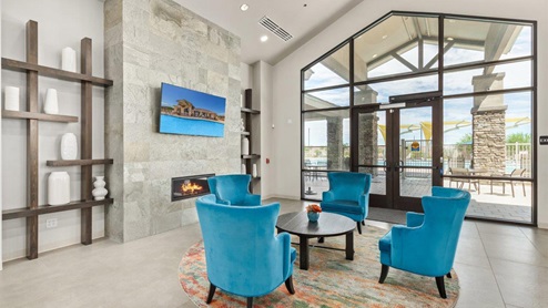 Explore New Homes at Saguaro Bloom by D.R. Horton – A Master-Planned Community in Marana, AZ. Nestled in the foothills of the breathtaking Tucson Mountains, Saguaro Bloom by D.R. Horton is a premier master-planned community in Northwest Marana that offers an exceptional living experience. Saguaro Bloom is divided into distinct neighborhoods, each offering its unique charm and amenities. *Mesquite at Saguaro Bloom* is located in Block 1 and offers a variety of spacious floorplans with 18x18 tile flooring, granite countertops in kitchen and bathrooms, and Shaker-style cabinets in white or gray. These homes feature 9’ ceilings on the first floor, island kitchens, and the Home is Connected® Smart Home package, making them perfect for modern living. *Agave at Saguaro Bloom*, situated in Block 7C, features homes with stunning 6x36” wood-look tile in gray, quartz countertops in kitchen and bathrooms, and Shaker-style cabinets. These homes are designed with stylish interiors and modern conveniences, including LED disc lighting and energy-efficient tankless water heaters. *Cholla Ridge at Saguaro Bloom*, located in Block 7B, offers single-story homes on lots with no rear neighbors. These homes are distinguished by beautiful 12x24” tile flooring, gourmet kitchens, and 10’ ceilings in select homes. With 8’ sliding glass patio doors and super showers, Cholla Ridge combines luxury and privacy in a serene setting. All homes in Saguaro Bloom are built with a Spanish lace stucco exterior, tile roofs, landscaped front yards with auto drip irrigation, and large, fully fenced backyards ready for your design. The homes also include covered front porches and back patios, stainless steel gas appliances, and executive height vanities in all bathrooms. Additionally, as of August 2024, all homes starting production are Zero Energy Ready, meeting rigorous energy efficiency standards that significantly reduce energy costs and environmental impact. Residents of Saguaro Bloom enjoy an array of community amenities, including a clubhouse, two pools with lap lanes and lagoon entry, a fitness center, a splash pad, and over 30 miles of walking trails. The community also features more than 20 pocket parks, playgrounds, and coming soon, a large community park with tennis, pickleball, soccer, baseball, and a dog park. Saguaro Bloom is truly a lifestyle community, offering regular events like Food Truck Thursdays, Movies at the Pool, and holiday decorating contests, all fostering a strong sense of community. Located in the highly-rated Marana Unified School District, Saguaro Bloom is close to excellent schools, including Rattlesnake Ridge Elementary, Marana Middle School, and Marana High School. The community’s location offers a perfect balance of seclusion and convenience, with quick access to I-10, grocery stores, restaurants, and the Twin Peaks Outlet, all within minutes. Downtown Tucson, with its vibrant arts, culture, and entertainment scene, is just a short 15-minute drive away. Surrounded by the natural beauty of the desert landscape, residents can explore nearby outdoor attractions like Saguaro National Park West, the Arizona Desert Museum, and Quarry Pines Golf Course. Whether you enjoy hiking, biking, or simply taking in the stunning views, Saguaro Bloom offers an unparalleled lifestyle in one of Arizona’s most sought-after locations. Discover the perfect blend of modern amenities, scenic beauty, and a strong sense of community at Saguaro Bloom by D.R. Horton – where your new home awaits in Marana, AZ.