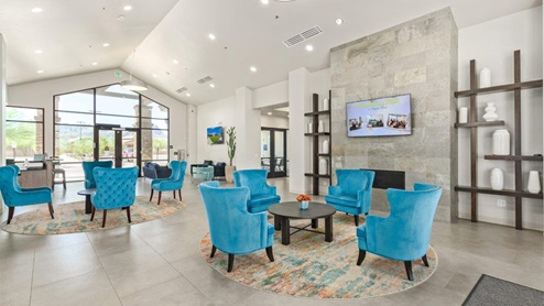 Explore New Homes at Saguaro Bloom by D.R. Horton – A Master-Planned Community in Marana, AZ. Nestled in the foothills of the breathtaking Tucson Mountains, Saguaro Bloom by D.R. Horton is a premier master-planned community in Northwest Marana that offers an exceptional living experience. Saguaro Bloom is divided into distinct neighborhoods, each offering its unique charm and amenities. *Mesquite at Saguaro Bloom* is located in Block 1 and offers a variety of spacious floorplans with 18x18 tile flooring, granite countertops in kitchen and bathrooms, and Shaker-style cabinets in white or gray. These homes feature 9’ ceilings on the first floor, island kitchens, and the Home is Connected® Smart Home package, making them perfect for modern living. *Agave at Saguaro Bloom*, situated in Block 7C, features homes with stunning 6x36” wood-look tile in gray, quartz countertops in kitchen and bathrooms, and Shaker-style cabinets. These homes are designed with stylish interiors and modern conveniences, including LED disc lighting and energy-efficient tankless water heaters. *Cholla Ridge at Saguaro Bloom*, located in Block 7B, offers single-story homes on lots with no rear neighbors. These homes are distinguished by beautiful 12x24” tile flooring, gourmet kitchens, and 10’ ceilings in select homes. With 8’ sliding glass patio doors and super showers, Cholla Ridge combines luxury and privacy in a serene setting. All homes in Saguaro Bloom are built with a Spanish lace stucco exterior, tile roofs, landscaped front yards with auto drip irrigation, and large, fully fenced backyards ready for your design. The homes also include covered front porches and back patios, stainless steel gas appliances, and executive height vanities in all bathrooms. Additionally, as of August 2024, all homes starting production are Zero Energy Ready, meeting rigorous energy efficiency standards that significantly reduce energy costs and environmental impact. Residents of Saguaro Bloom enjoy an array of community amenities, including a clubhouse, two pools with lap lanes and lagoon entry, a fitness center, a splash pad, and over 30 miles of walking trails. The community also features more than 20 pocket parks, playgrounds, and coming soon, a large community park with tennis, pickleball, soccer, baseball, and a dog park. Saguaro Bloom is truly a lifestyle community, offering regular events like Food Truck Thursdays, Movies at the Pool, and holiday decorating contests, all fostering a strong sense of community. Located in the highly-rated Marana Unified School District, Saguaro Bloom is close to excellent schools, including Rattlesnake Ridge Elementary, Marana Middle School, and Marana High School. The community’s location offers a perfect balance of seclusion and convenience, with quick access to I-10, grocery stores, restaurants, and the Twin Peaks Outlet, all within minutes. Downtown Tucson, with its vibrant arts, culture, and entertainment scene, is just a short 15-minute drive away. Surrounded by the natural beauty of the desert landscape, residents can explore nearby outdoor attractions like Saguaro National Park West, the Arizona Desert Museum, and Quarry Pines Golf Course. Whether you enjoy hiking, biking, or simply taking in the stunning views, Saguaro Bloom offers an unparalleled lifestyle in one of Arizona’s most sought-after locations. Discover the perfect blend of modern amenities, scenic beauty, and a strong sense of community at Saguaro Bloom by D.R. Horton – where your new home awaits in Marana, AZ.