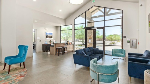 Explore New Homes at Saguaro Bloom by D.R. Horton – A Master-Planned Community in Marana, AZ. Nestled in the foothills of the breathtaking Tucson Mountains, Saguaro Bloom by D.R. Horton is a premier master-planned community in Northwest Marana that offers an exceptional living experience. Saguaro Bloom is divided into distinct neighborhoods, each offering its unique charm and amenities. *Mesquite at Saguaro Bloom* is located in Block 1 and offers a variety of spacious floorplans with 18x18 tile flooring, granite countertops in kitchen and bathrooms, and Shaker-style cabinets in white or gray. These homes feature 9’ ceilings on the first floor, island kitchens, and the Home is Connected® Smart Home package, making them perfect for modern living. *Agave at Saguaro Bloom*, situated in Block 7C, features homes with stunning 6x36” wood-look tile in gray, quartz countertops in kitchen and bathrooms, and Shaker-style cabinets. These homes are designed with stylish interiors and modern conveniences, including LED disc lighting and energy-efficient tankless water heaters. *Cholla Ridge at Saguaro Bloom*, located in Block 7B, offers single-story homes on lots with no rear neighbors. These homes are distinguished by beautiful 12x24” tile flooring, gourmet kitchens, and 10’ ceilings in select homes. With 8’ sliding glass patio doors and super showers, Cholla Ridge combines luxury and privacy in a serene setting. All homes in Saguaro Bloom are built with a Spanish lace stucco exterior, tile roofs, landscaped front yards with auto drip irrigation, and large, fully fenced backyards ready for your design. The homes also include covered front porches and back patios, stainless steel gas appliances, and executive height vanities in all bathrooms. Additionally, as of August 2024, all homes starting production are Zero Energy Ready, meeting rigorous energy efficiency standards that significantly reduce energy costs and environmental impact. Residents of Saguaro Bloom enjoy an array of community amenities, including a clubhouse, two pools with lap lanes and lagoon entry, a fitness center, a splash pad, and over 30 miles of walking trails. The community also features more than 20 pocket parks, playgrounds, and coming soon, a large community park with tennis, pickleball, soccer, baseball, and a dog park. Saguaro Bloom is truly a lifestyle community, offering regular events like Food Truck Thursdays, Movies at the Pool, and holiday decorating contests, all fostering a strong sense of community. Located in the highly-rated Marana Unified School District, Saguaro Bloom is close to excellent schools, including Rattlesnake Ridge Elementary, Marana Middle School, and Marana High School. The community’s location offers a perfect balance of seclusion and convenience, with quick access to I-10, grocery stores, restaurants, and the Twin Peaks Outlet, all within minutes. Downtown Tucson, with its vibrant arts, culture, and entertainment scene, is just a short 15-minute drive away. Surrounded by the natural beauty of the desert landscape, residents can explore nearby outdoor attractions like Saguaro National Park West, the Arizona Desert Museum, and Quarry Pines Golf Course. Whether you enjoy hiking, biking, or simply taking in the stunning views, Saguaro Bloom offers an unparalleled lifestyle in one of Arizona’s most sought-after locations. Discover the perfect blend of modern amenities, scenic beauty, and a strong sense of community at Saguaro Bloom by D.R. Horton – where your new home awaits in Marana, AZ.