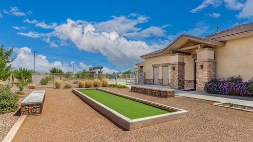Explore New Homes at Saguaro Bloom by D.R. Horton – A Master-Planned Community in Marana, AZ. Nestled in the foothills of the breathtaking Tucson Mountains, Saguaro Bloom by D.R. Horton is a premier master-planned community in Northwest Marana that offers an exceptional living experience. Saguaro Bloom is divided into distinct neighborhoods, each offering its unique charm and amenities. *Mesquite at Saguaro Bloom* is located in Block 1 and offers a variety of spacious floorplans with 18x18 tile flooring, granite countertops in kitchen and bathrooms, and Shaker-style cabinets in white or gray. These homes feature 9’ ceilings on the first floor, island kitchens, and the Home is Connected® Smart Home package, making them perfect for modern living. *Agave at Saguaro Bloom*, situated in Block 7C, features homes with stunning 6x36” wood-look tile in gray, quartz countertops in kitchen and bathrooms, and Shaker-style cabinets. These homes are designed with stylish interiors and modern conveniences, including LED disc lighting and energy-efficient tankless water heaters. *Cholla Ridge at Saguaro Bloom*, located in Block 7B, offers single-story homes on lots with no rear neighbors. These homes are distinguished by beautiful 12x24” tile flooring, gourmet kitchens, and 10’ ceilings in select homes. With 8’ sliding glass patio doors and super showers, Cholla Ridge combines luxury and privacy in a serene setting. All homes in Saguaro Bloom are built with a Spanish lace stucco exterior, tile roofs, landscaped front yards with auto drip irrigation, and large, fully fenced backyards ready for your design. The homes also include covered front porches and back patios, stainless steel gas appliances, and executive height vanities in all bathrooms. Additionally, as of August 2024, all homes starting production are Zero Energy Ready, meeting rigorous energy efficiency standards that significantly reduce energy costs and environmental impact. Residents of Saguaro Bloom enjoy an array of community amenities, including a clubhouse, two pools with lap lanes and lagoon entry, a fitness center, a splash pad, and over 30 miles of walking trails. The community also features more than 20 pocket parks, playgrounds, and coming soon, a large community park with tennis, pickleball, soccer, baseball, and a dog park. Saguaro Bloom is truly a lifestyle community, offering regular events like Food Truck Thursdays, Movies at the Pool, and holiday decorating contests, all fostering a strong sense of community. Located in the highly-rated Marana Unified School District, Saguaro Bloom is close to excellent schools, including Rattlesnake Ridge Elementary, Marana Middle School, and Marana High School. The community’s location offers a perfect balance of seclusion and convenience, with quick access to I-10, grocery stores, restaurants, and the Twin Peaks Outlet, all within minutes. Downtown Tucson, with its vibrant arts, culture, and entertainment scene, is just a short 15-minute drive away. Surrounded by the natural beauty of the desert landscape, residents can explore nearby outdoor attractions like Saguaro National Park West, the Arizona Desert Museum, and Quarry Pines Golf Course. Whether you enjoy hiking, biking, or simply taking in the stunning views, Saguaro Bloom offers an unparalleled lifestyle in one of Arizona’s most sought-after locations. Discover the perfect blend of modern amenities, scenic beauty, and a strong sense of community at Saguaro Bloom by D.R. Horton – where your new home awaits in Marana, AZ.