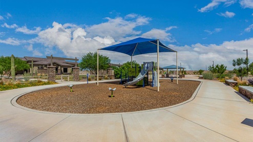 Explore New Homes at Saguaro Bloom by D.R. Horton – A Master-Planned Community in Marana, AZ. Nestled in the foothills of the breathtaking Tucson Mountains, Saguaro Bloom by D.R. Horton is a premier master-planned community in Northwest Marana that offers an exceptional living experience. Saguaro Bloom is divided into distinct neighborhoods, each offering its unique charm and amenities. *Mesquite at Saguaro Bloom* is located in Block 1 and offers a variety of spacious floorplans with 18x18 tile flooring, granite countertops in kitchen and bathrooms, and Shaker-style cabinets in white or gray. These homes feature 9’ ceilings on the first floor, island kitchens, and the Home is Connected® Smart Home package, making them perfect for modern living. *Agave at Saguaro Bloom*, situated in Block 7C, features homes with stunning 6x36” wood-look tile in gray, quartz countertops in kitchen and bathrooms, and Shaker-style cabinets. These homes are designed with stylish interiors and modern conveniences, including LED disc lighting and energy-efficient tankless water heaters. *Cholla Ridge at Saguaro Bloom*, located in Block 7B, offers single-story homes on lots with no rear neighbors. These homes are distinguished by beautiful 12x24” tile flooring, gourmet kitchens, and 10’ ceilings in select homes. With 8’ sliding glass patio doors and super showers, Cholla Ridge combines luxury and privacy in a serene setting. All homes in Saguaro Bloom are built with a Spanish lace stucco exterior, tile roofs, landscaped front yards with auto drip irrigation, and large, fully fenced backyards ready for your design. The homes also include covered front porches and back patios, stainless steel gas appliances, and executive height vanities in all bathrooms. Additionally, as of August 2024, all homes starting production are Zero Energy Ready, meeting rigorous energy efficiency standards that significantly reduce energy costs and environmental impact. Residents of Saguaro Bloom enjoy an array of community amenities, including a clubhouse, two pools with lap lanes and lagoon entry, a fitness center, a splash pad, and over 30 miles of walking trails. The community also features more than 20 pocket parks, playgrounds, and coming soon, a large community park with tennis, pickleball, soccer, baseball, and a dog park. Saguaro Bloom is truly a lifestyle community, offering regular events like Food Truck Thursdays, Movies at the Pool, and holiday decorating contests, all fostering a strong sense of community. Located in the highly-rated Marana Unified School District, Saguaro Bloom is close to excellent schools, including Rattlesnake Ridge Elementary, Marana Middle School, and Marana High School. The community’s location offers a perfect balance of seclusion and convenience, with quick access to I-10, grocery stores, restaurants, and the Twin Peaks Outlet, all within minutes. Downtown Tucson, with its vibrant arts, culture, and entertainment scene, is just a short 15-minute drive away. Surrounded by the natural beauty of the desert landscape, residents can explore nearby outdoor attractions like Saguaro National Park West, the Arizona Desert Museum, and Quarry Pines Golf Course. Whether you enjoy hiking, biking, or simply taking in the stunning views, Saguaro Bloom offers an unparalleled lifestyle in one of Arizona’s most sought-after locations. Discover the perfect blend of modern amenities, scenic beauty, and a strong sense of community at Saguaro Bloom by D.R. Horton – where your new home awaits in Marana, AZ.