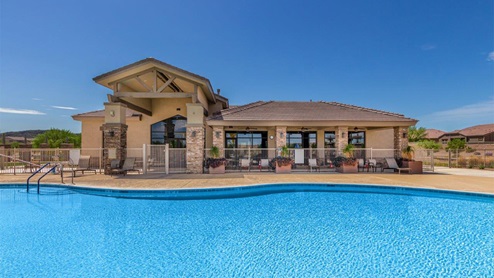 Explore New Homes at Saguaro Bloom by D.R. Horton – A Master-Planned Community in Marana, AZ. Nestled in the foothills of the breathtaking Tucson Mountains, Saguaro Bloom by D.R. Horton is a premier master-planned community in Northwest Marana that offers an exceptional living experience. Saguaro Bloom is divided into distinct neighborhoods, each offering its unique charm and amenities. *Mesquite at Saguaro Bloom* is located in Block 1 and offers a variety of spacious floorplans with 18x18 tile flooring, granite countertops in kitchen and bathrooms, and Shaker-style cabinets in white or gray. These homes feature 9’ ceilings on the first floor, island kitchens, and the Home is Connected® Smart Home package, making them perfect for modern living. *Agave at Saguaro Bloom*, situated in Block 7C, features homes with stunning 6x36” wood-look tile in gray, quartz countertops in kitchen and bathrooms, and Shaker-style cabinets. These homes are designed with stylish interiors and modern conveniences, including LED disc lighting and energy-efficient tankless water heaters. *Cholla Ridge at Saguaro Bloom*, located in Block 7B, offers single-story homes on lots with no rear neighbors. These homes are distinguished by beautiful 12x24” tile flooring, gourmet kitchens, and 10’ ceilings in select homes. With 8’ sliding glass patio doors and super showers, Cholla Ridge combines luxury and privacy in a serene setting. All homes in Saguaro Bloom are built with a Spanish lace stucco exterior, tile roofs, landscaped front yards with auto drip irrigation, and large, fully fenced backyards ready for your design. The homes also include covered front porches and back patios, stainless steel gas appliances, and executive height vanities in all bathrooms. Additionally, as of August 2024, all homes starting production are Zero Energy Ready, meeting rigorous energy efficiency standards that significantly reduce energy costs and environmental impact. Residents of Saguaro Bloom enjoy an array of community amenities, including a clubhouse, two pools with lap lanes and lagoon entry, a fitness center, a splash pad, and over 30 miles of walking trails. The community also features more than 20 pocket parks, playgrounds, and coming soon, a large community park with tennis, pickleball, soccer, baseball, and a dog park. Saguaro Bloom is truly a lifestyle community, offering regular events like Food Truck Thursdays, Movies at the Pool, and holiday decorating contests, all fostering a strong sense of community. Located in the highly-rated Marana Unified School District, Saguaro Bloom is close to excellent schools, including Rattlesnake Ridge Elementary, Marana Middle School, and Marana High School. The community’s location offers a perfect balance of seclusion and convenience, with quick access to I-10, grocery stores, restaurants, and the Twin Peaks Outlet, all within minutes. Downtown Tucson, with its vibrant arts, culture, and entertainment scene, is just a short 15-minute drive away. Surrounded by the natural beauty of the desert landscape, residents can explore nearby outdoor attractions like Saguaro National Park West, the Arizona Desert Museum, and Quarry Pines Golf Course. Whether you enjoy hiking, biking, or simply taking in the stunning views, Saguaro Bloom offers an unparalleled lifestyle in one of Arizona’s most sought-after locations. Discover the perfect blend of modern amenities, scenic beauty, and a strong sense of community at Saguaro Bloom by D.R. Horton – where your new home awaits in Marana, AZ.