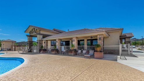 Explore New Homes at Saguaro Bloom by D.R. Horton – A Master-Planned Community in Marana, AZ. Nestled in the foothills of the breathtaking Tucson Mountains, Saguaro Bloom by D.R. Horton is a premier master-planned community in Northwest Marana that offers an exceptional living experience. Saguaro Bloom is divided into distinct neighborhoods, each offering its unique charm and amenities. *Mesquite at Saguaro Bloom* is located in Block 1 and offers a variety of spacious floorplans with 18x18 tile flooring, granite countertops in kitchen and bathrooms, and Shaker-style cabinets in white or gray. These homes feature 9’ ceilings on the first floor, island kitchens, and the Home is Connected® Smart Home package, making them perfect for modern living. *Agave at Saguaro Bloom*, situated in Block 7C, features homes with stunning 6x36” wood-look tile in gray, quartz countertops in kitchen and bathrooms, and Shaker-style cabinets. These homes are designed with stylish interiors and modern conveniences, including LED disc lighting and energy-efficient tankless water heaters. *Cholla Ridge at Saguaro Bloom*, located in Block 7B, offers single-story homes on lots with no rear neighbors. These homes are distinguished by beautiful 12x24” tile flooring, gourmet kitchens, and 10’ ceilings in select homes. With 8’ sliding glass patio doors and super showers, Cholla Ridge combines luxury and privacy in a serene setting. All homes in Saguaro Bloom are built with a Spanish lace stucco exterior, tile roofs, landscaped front yards with auto drip irrigation, and large, fully fenced backyards ready for your design. The homes also include covered front porches and back patios, stainless steel gas appliances, and executive height vanities in all bathrooms. Additionally, as of August 2024, all homes starting production are Zero Energy Ready, meeting rigorous energy efficiency standards that significantly reduce energy costs and environmental impact. Residents of Saguaro Bloom enjoy an array of community amenities, including a clubhouse, two pools with lap lanes and lagoon entry, a fitness center, a splash pad, and over 30 miles of walking trails. The community also features more than 20 pocket parks, playgrounds, and coming soon, a large community park with tennis, pickleball, soccer, baseball, and a dog park. Saguaro Bloom is truly a lifestyle community, offering regular events like Food Truck Thursdays, Movies at the Pool, and holiday decorating contests, all fostering a strong sense of community. Located in the highly-rated Marana Unified School District, Saguaro Bloom is close to excellent schools, including Rattlesnake Ridge Elementary, Marana Middle School, and Marana High School. The community’s location offers a perfect balance of seclusion and convenience, with quick access to I-10, grocery stores, restaurants, and the Twin Peaks Outlet, all within minutes. Downtown Tucson, with its vibrant arts, culture, and entertainment scene, is just a short 15-minute drive away. Surrounded by the natural beauty of the desert landscape, residents can explore nearby outdoor attractions like Saguaro National Park West, the Arizona Desert Museum, and Quarry Pines Golf Course. Whether you enjoy hiking, biking, or simply taking in the stunning views, Saguaro Bloom offers an unparalleled lifestyle in one of Arizona’s most sought-after locations. Discover the perfect blend of modern amenities, scenic beauty, and a strong sense of community at Saguaro Bloom by D.R. Horton – where your new home awaits in Marana, AZ.