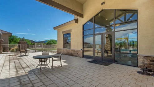 Explore New Homes at Saguaro Bloom by D.R. Horton – A Master-Planned Community in Marana, AZ. Nestled in the foothills of the breathtaking Tucson Mountains, Saguaro Bloom by D.R. Horton is a premier master-planned community in Northwest Marana that offers an exceptional living experience. Saguaro Bloom is divided into distinct neighborhoods, each offering its unique charm and amenities. *Mesquite at Saguaro Bloom* is located in Block 1 and offers a variety of spacious floorplans with 18x18 tile flooring, granite countertops in kitchen and bathrooms, and Shaker-style cabinets in white or gray. These homes feature 9’ ceilings on the first floor, island kitchens, and the Home is Connected® Smart Home package, making them perfect for modern living. *Agave at Saguaro Bloom*, situated in Block 7C, features homes with stunning 6x36” wood-look tile in gray, quartz countertops in kitchen and bathrooms, and Shaker-style cabinets. These homes are designed with stylish interiors and modern conveniences, including LED disc lighting and energy-efficient tankless water heaters. *Cholla Ridge at Saguaro Bloom*, located in Block 7B, offers single-story homes on lots with no rear neighbors. These homes are distinguished by beautiful 12x24” tile flooring, gourmet kitchens, and 10’ ceilings in select homes. With 8’ sliding glass patio doors and super showers, Cholla Ridge combines luxury and privacy in a serene setting. All homes in Saguaro Bloom are built with a Spanish lace stucco exterior, tile roofs, landscaped front yards with auto drip irrigation, and large, fully fenced backyards ready for your design. The homes also include covered front porches and back patios, stainless steel gas appliances, and executive height vanities in all bathrooms. Additionally, as of August 2024, all homes starting production are Zero Energy Ready, meeting rigorous energy efficiency standards that significantly reduce energy costs and environmental impact. Residents of Saguaro Bloom enjoy an array of community amenities, including a clubhouse, two pools with lap lanes and lagoon entry, a fitness center, a splash pad, and over 30 miles of walking trails. The community also features more than 20 pocket parks, playgrounds, and coming soon, a large community park with tennis, pickleball, soccer, baseball, and a dog park. Saguaro Bloom is truly a lifestyle community, offering regular events like Food Truck Thursdays, Movies at the Pool, and holiday decorating contests, all fostering a strong sense of community. Located in the highly-rated Marana Unified School District, Saguaro Bloom is close to excellent schools, including Rattlesnake Ridge Elementary, Marana Middle School, and Marana High School. The community’s location offers a perfect balance of seclusion and convenience, with quick access to I-10, grocery stores, restaurants, and the Twin Peaks Outlet, all within minutes. Downtown Tucson, with its vibrant arts, culture, and entertainment scene, is just a short 15-minute drive away. Surrounded by the natural beauty of the desert landscape, residents can explore nearby outdoor attractions like Saguaro National Park West, the Arizona Desert Museum, and Quarry Pines Golf Course. Whether you enjoy hiking, biking, or simply taking in the stunning views, Saguaro Bloom offers an unparalleled lifestyle in one of Arizona’s most sought-after locations. Discover the perfect blend of modern amenities, scenic beauty, and a strong sense of community at Saguaro Bloom by D.R. Horton – where your new home awaits in Marana, AZ.