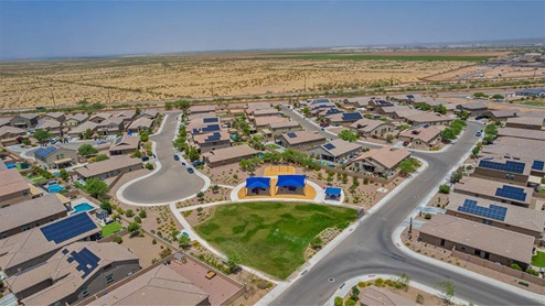 Explore New Homes at Saguaro Bloom by D.R. Horton – A Master-Planned Community in Marana, AZ. Nestled in the foothills of the breathtaking Tucson Mountains, Saguaro Bloom by D.R. Horton is a premier master-planned community in Northwest Marana that offers an exceptional living experience. Saguaro Bloom is divided into distinct neighborhoods, each offering its unique charm and amenities. *Mesquite at Saguaro Bloom* is located in Block 1 and offers a variety of spacious floorplans with 18x18 tile flooring, granite countertops in kitchen and bathrooms, and Shaker-style cabinets in white or gray. These homes feature 9’ ceilings on the first floor, island kitchens, and the Home is Connected® Smart Home package, making them perfect for modern living. *Agave at Saguaro Bloom*, situated in Block 7C, features homes with stunning 6x36” wood-look tile in gray, quartz countertops in kitchen and bathrooms, and Shaker-style cabinets. These homes are designed with stylish interiors and modern conveniences, including LED disc lighting and energy-efficient tankless water heaters. *Cholla Ridge at Saguaro Bloom*, located in Block 7B, offers single-story homes on lots with no rear neighbors. These homes are distinguished by beautiful 12x24” tile flooring, gourmet kitchens, and 10’ ceilings in select homes. With 8’ sliding glass patio doors and super showers, Cholla Ridge combines luxury and privacy in a serene setting. All homes in Saguaro Bloom are built with a Spanish lace stucco exterior, tile roofs, landscaped front yards with auto drip irrigation, and large, fully fenced backyards ready for your design. The homes also include covered front porches and back patios, stainless steel gas appliances, and executive height vanities in all bathrooms. Additionally, as of August 2024, all homes starting production are Zero Energy Ready, meeting rigorous energy efficiency standards that significantly reduce energy costs and environmental impact. Residents of Saguaro Bloom enjoy an array of community amenities, including a clubhouse, two pools with lap lanes and lagoon entry, a fitness center, a splash pad, and over 30 miles of walking trails. The community also features more than 20 pocket parks, playgrounds, and coming soon, a large community park with tennis, pickleball, soccer, baseball, and a dog park. Saguaro Bloom is truly a lifestyle community, offering regular events like Food Truck Thursdays, Movies at the Pool, and holiday decorating contests, all fostering a strong sense of community. Located in the highly-rated Marana Unified School District, Saguaro Bloom is close to excellent schools, including Rattlesnake Ridge Elementary, Marana Middle School, and Marana High School. The community’s location offers a perfect balance of seclusion and convenience, with quick access to I-10, grocery stores, restaurants, and the Twin Peaks Outlet, all within minutes. Downtown Tucson, with its vibrant arts, culture, and entertainment scene, is just a short 15-minute drive away. Surrounded by the natural beauty of the desert landscape, residents can explore nearby outdoor attractions like Saguaro National Park West, the Arizona Desert Museum, and Quarry Pines Golf Course. Whether you enjoy hiking, biking, or simply taking in the stunning views, Saguaro Bloom offers an unparalleled lifestyle in one of Arizona’s most sought-after locations. Discover the perfect blend of modern amenities, scenic beauty, and a strong sense of community at Saguaro Bloom by D.R. Horton – where your new home awaits in Marana, AZ.