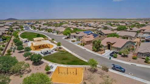 Explore New Homes at Saguaro Bloom by D.R. Horton – A Master-Planned Community in Marana, AZ. Nestled in the foothills of the breathtaking Tucson Mountains, Saguaro Bloom by D.R. Horton is a premier master-planned community in Northwest Marana that offers an exceptional living experience. Saguaro Bloom is divided into distinct neighborhoods, each offering its unique charm and amenities. *Mesquite at Saguaro Bloom* is located in Block 1 and offers a variety of spacious floorplans with 18x18 tile flooring, granite countertops in kitchen and bathrooms, and Shaker-style cabinets in white or gray. These homes feature 9’ ceilings on the first floor, island kitchens, and the Home is Connected® Smart Home package, making them perfect for modern living. *Agave at Saguaro Bloom*, situated in Block 7C, features homes with stunning 6x36” wood-look tile in gray, quartz countertops in kitchen and bathrooms, and Shaker-style cabinets. These homes are designed with stylish interiors and modern conveniences, including LED disc lighting and energy-efficient tankless water heaters. *Cholla Ridge at Saguaro Bloom*, located in Block 7B, offers single-story homes on lots with no rear neighbors. These homes are distinguished by beautiful 12x24” tile flooring, gourmet kitchens, and 10’ ceilings in select homes. With 8’ sliding glass patio doors and super showers, Cholla Ridge combines luxury and privacy in a serene setting. All homes in Saguaro Bloom are built with a Spanish lace stucco exterior, tile roofs, landscaped front yards with auto drip irrigation, and large, fully fenced backyards ready for your design. The homes also include covered front porches and back patios, stainless steel gas appliances, and executive height vanities in all bathrooms. Additionally, as of August 2024, all homes starting production are Zero Energy Ready, meeting rigorous energy efficiency standards that significantly reduce energy costs and environmental impact. Residents of Saguaro Bloom enjoy an array of community amenities, including a clubhouse, two pools with lap lanes and lagoon entry, a fitness center, a splash pad, and over 30 miles of walking trails. The community also features more than 20 pocket parks, playgrounds, and coming soon, a large community park with tennis, pickleball, soccer, baseball, and a dog park. Saguaro Bloom is truly a lifestyle community, offering regular events like Food Truck Thursdays, Movies at the Pool, and holiday decorating contests, all fostering a strong sense of community. Located in the highly-rated Marana Unified School District, Saguaro Bloom is close to excellent schools, including Rattlesnake Ridge Elementary, Marana Middle School, and Marana High School. The community’s location offers a perfect balance of seclusion and convenience, with quick access to I-10, grocery stores, restaurants, and the Twin Peaks Outlet, all within minutes. Downtown Tucson, with its vibrant arts, culture, and entertainment scene, is just a short 15-minute drive away. Surrounded by the natural beauty of the desert landscape, residents can explore nearby outdoor attractions like Saguaro National Park West, the Arizona Desert Museum, and Quarry Pines Golf Course. Whether you enjoy hiking, biking, or simply taking in the stunning views, Saguaro Bloom offers an unparalleled lifestyle in one of Arizona’s most sought-after locations. Discover the perfect blend of modern amenities, scenic beauty, and a strong sense of community at Saguaro Bloom by D.R. Horton – where your new home awaits in Marana, AZ.