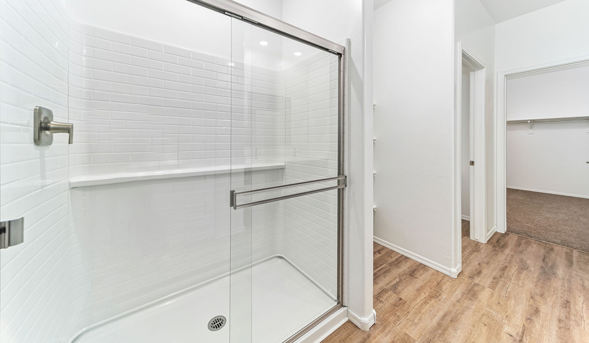 The Dalea is a standout single-story new home floorplan available in the Saguaro Bloom community in Marana, Arizona. Offering 2,224 square feet of living space, this home is designed to accommodate modern living with comfort and style. The Dalea provides a spacious layout with plenty of options such as four to five bedrooms and three full bathrooms, making it an ideal choice for families of all sizes.  As you step into the charming front porch, you are greeted by a spacious and open floor plan that seamlessly connects the main living areas. The great room serves as the central hub of the home, flowing into a dining area and modern kitchen area. The kitchen features a large central island, quartz countertops, Shaker-style cabinetry, walk-in pantry, and ample storage for all your culinary needs.  The primary suite, located at the rear of the home, provides a private retreat with a spacious bedroom, a large walk-in closet, and an en-suite bathroom and a walk-in shower. The Dalea floor plan also includes a utility room and two-car garage with the option of three-car tandem garage.  Living at Saguaro Bloom means more than just having a beautiful home. The community offers a peaceful lifestyle with incredible desert landscapes, mountain views, and easy access to I-10 for convenient commutes to Tucson and surrounding areas. Designed with energy efficiency in mind, The Dalea at Saguaro Bloom meets Zero Energy Ready Home standards, ensuring sustainability and long-term savings.  Step outside to the covered patio, perfect for enjoying the Arizona climate. Whether you're hosting a summer barbecue or simply unwinding in the evening, this outdoor space is a valuable addition to the home.  Residents of Saguaro Bloom enjoy an array of community amenities, including a clubhouse, two pools with lap lanes and lagoon entry, a fitness center, a splash pad, and over 30 miles of walking trails. This vibrant neighborhood is the perfect setting for those looking to enjoy the best of Arizona living.