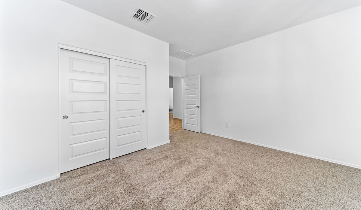 The Dalea is a standout single-story new home floorplan available in the Saguaro Bloom community in Marana, Arizona. Offering 2,224 square feet of living space, this home is designed to accommodate modern living with comfort and style. The Dalea provides a spacious layout with plenty of options such as four to five bedrooms and three full bathrooms, making it an ideal choice for families of all sizes.  As you step into the charming front porch, you are greeted by a spacious and open floor plan that seamlessly connects the main living areas. The great room serves as the central hub of the home, flowing into a dining area and modern kitchen area. The kitchen features a large central island, quartz countertops, Shaker-style cabinetry, walk-in pantry, and ample storage for all your culinary needs.  The primary suite, located at the rear of the home, provides a private retreat with a spacious bedroom, a large walk-in closet, and an en-suite bathroom and a walk-in shower. The Dalea floor plan also includes a utility room and two-car garage with the option of three-car tandem garage.  Living at Saguaro Bloom means more than just having a beautiful home. The community offers a peaceful lifestyle with incredible desert landscapes, mountain views, and easy access to I-10 for convenient commutes to Tucson and surrounding areas. Designed with energy efficiency in mind, The Dalea at Saguaro Bloom meets Zero Energy Ready Home standards, ensuring sustainability and long-term savings.  Step outside to the covered patio, perfect for enjoying the Arizona climate. Whether you're hosting a summer barbecue or simply unwinding in the evening, this outdoor space is a valuable addition to the home.  Residents of Saguaro Bloom enjoy an array of community amenities, including a clubhouse, two pools with lap lanes and lagoon entry, a fitness center, a splash pad, and over 30 miles of walking trails. This vibrant neighborhood is the perfect setting for those looking to enjoy the best of Arizona living.