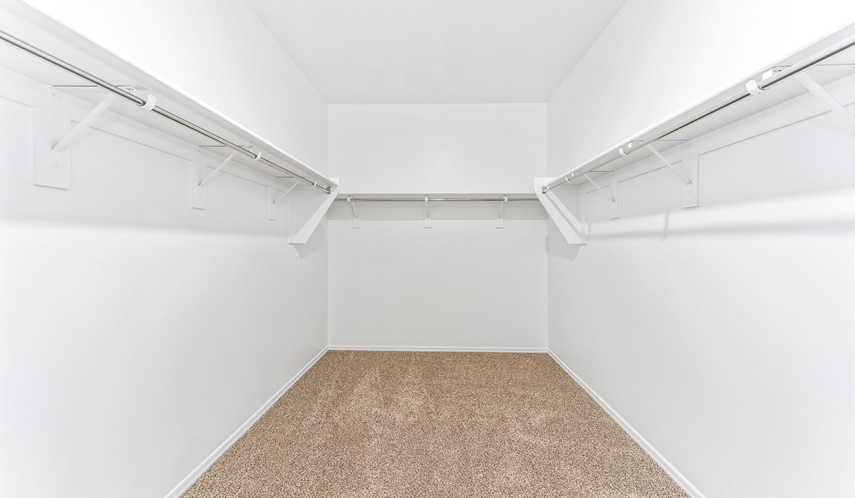 The Dalea is a standout single-story new home floorplan available in the Saguaro Bloom community in Marana, Arizona. Offering 2,224 square feet of living space, this home is designed to accommodate modern living with comfort and style. The Dalea provides a spacious layout with plenty of options such as four to five bedrooms and three full bathrooms, making it an ideal choice for families of all sizes.  As you step into the charming front porch, you are greeted by a spacious and open floor plan that seamlessly connects the main living areas. The great room serves as the central hub of the home, flowing into a dining area and modern kitchen area. The kitchen features a large central island, quartz countertops, Shaker-style cabinetry, walk-in pantry, and ample storage for all your culinary needs.  The primary suite, located at the rear of the home, provides a private retreat with a spacious bedroom, a large walk-in closet, and an en-suite bathroom and a walk-in shower. The Dalea floor plan also includes a utility room and two-car garage with the option of three-car tandem garage.  Living at Saguaro Bloom means more than just having a beautiful home. The community offers a peaceful lifestyle with incredible desert landscapes, mountain views, and easy access to I-10 for convenient commutes to Tucson and surrounding areas. Designed with energy efficiency in mind, The Dalea at Saguaro Bloom meets Zero Energy Ready Home standards, ensuring sustainability and long-term savings.  Step outside to the covered patio, perfect for enjoying the Arizona climate. Whether you're hosting a summer barbecue or simply unwinding in the evening, this outdoor space is a valuable addition to the home.  Residents of Saguaro Bloom enjoy an array of community amenities, including a clubhouse, two pools with lap lanes and lagoon entry, a fitness center, a splash pad, and over 30 miles of walking trails. This vibrant neighborhood is the perfect setting for those looking to enjoy the best of Arizona living.