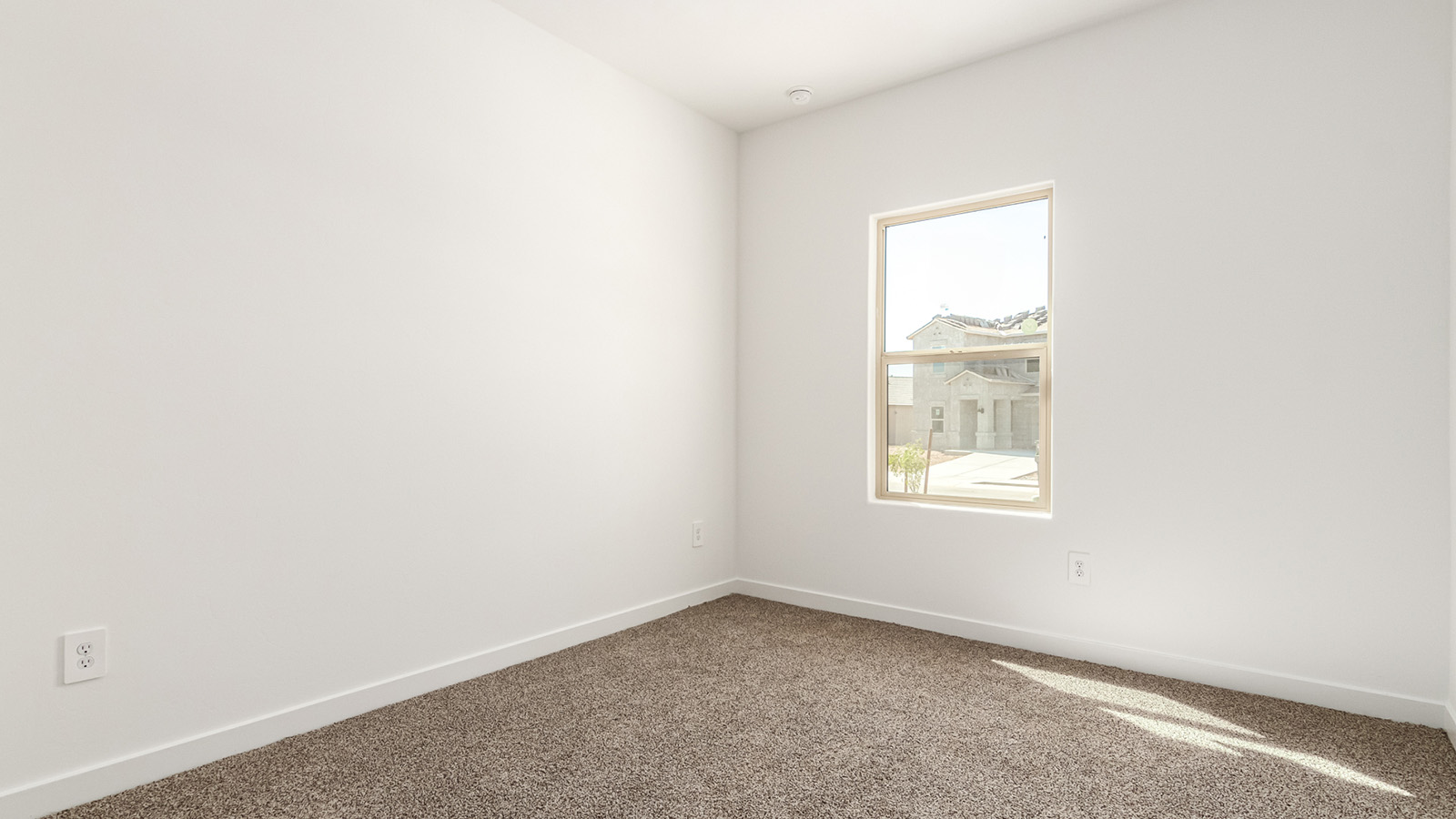 Welcome to The Baxter in Agave at Saguaro Bloom, a vibrant neighborhood within the master-planned community of Saguaro Bloom in Marana, Arizona. Placed against the beautiful backdrop of the Tucson Mountains, Agave at Saguaro Bloom offers residents a unique blend of modern convenience and natural beauty. The Baxter floorplan, one of the standout designs in this neighborhood, is a 1,423 square foot home featuring three bedrooms and two bathrooms, all crafted with the quality and style synonymous with D.R. Horton homes.  As you step inside The Baxter, you’ll find a spacious great room that seamlessly connects to the dining area and kitchen, creating an ideal space for both entertaining and everyday living. The kitchen is outfitted with quartz countertops, Shaker-style cabinets, and stainless steel gas appliances, making it both stylish and functional. The master suite offers a private retreat with a walk-in closet and an en suite bathroom featuring executive height vanities.  This home also includes two additional bedrooms, perfect for family members or guests, along with a second full bathroom. The utility room is conveniently located near the kitchen, offering additional storage and functionality. Outside, a covered patio provides a shaded space for outdoor dining or simply enjoying the Arizona sunsets.  Residents of Agave at Saguaro Bloom enjoy a host of community amenities, including access to two pools, a fitness center, over 30 miles of walking trails, and numerous parks and playgrounds. The neighborhood’s location within the highly-rated Marana Unified School District, and its proximity to both urban conveniences and natural attractions, make it an ideal place to call home.  In addition to its prime location and community features, The Baxter also includes energy-efficient features like LED lighting, tankless water heaters, and is part of D.R. Horton’s Zero Energy Ready Home program, ensuring lower energy costs and a reduced environmental impact.  Come explore The Baxter at Agave at Saguaro Bloom, where modern living meets the beauty of Arizona’s desert landscape.