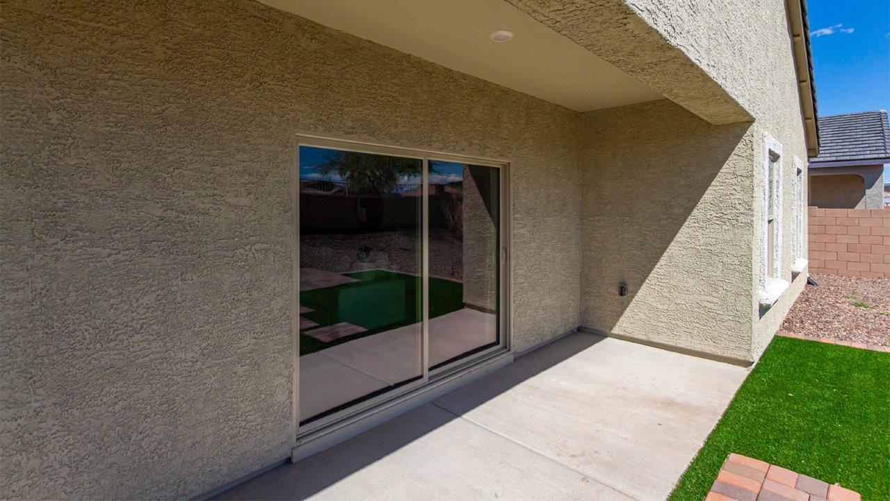 Welcome to the Kingston floor plan in the Agave neighborhood at Saguaro Bloom, Marana, Arizona—a perfect blend of comfort, modern living, and energy efficiency. This thoughtfully crafted one-story home spans 2,051 square feet and offers four bedrooms and two bathrooms, ideal for families of all sizes.  The open-concept design features a spacious great room that effortlessly connects with the kitchen and dining area, creating an inviting central hub for everyday living and entertaining. The kitchen is equipped with contemporary appliances and a pantry.  The primary bedroom, located at the rear of the home, provides a peaceful retreat with a private ensuite bathroom and a walk-in closet. The additional three bedrooms are positioned at the front of the house, offering versatility for use as guest rooms, a home office, or children’s bedrooms. Step outside to the covered patio, a perfect spot to enjoy the beautiful Arizona weather.  Built with energy efficiency as a priority, the Kingston includes smart home technology, which not only simplifies daily living but also helps reduce utility costs. A two-car garage provides ample parking and additional storage space, enhancing the home’s functionality.  Residents of Saguaro Bloom enjoy access to a range of community amenities, including parks, walking trails, and recreational facilities, making this home an ideal choice for those seeking a balanced lifestyle in a scenic setting.