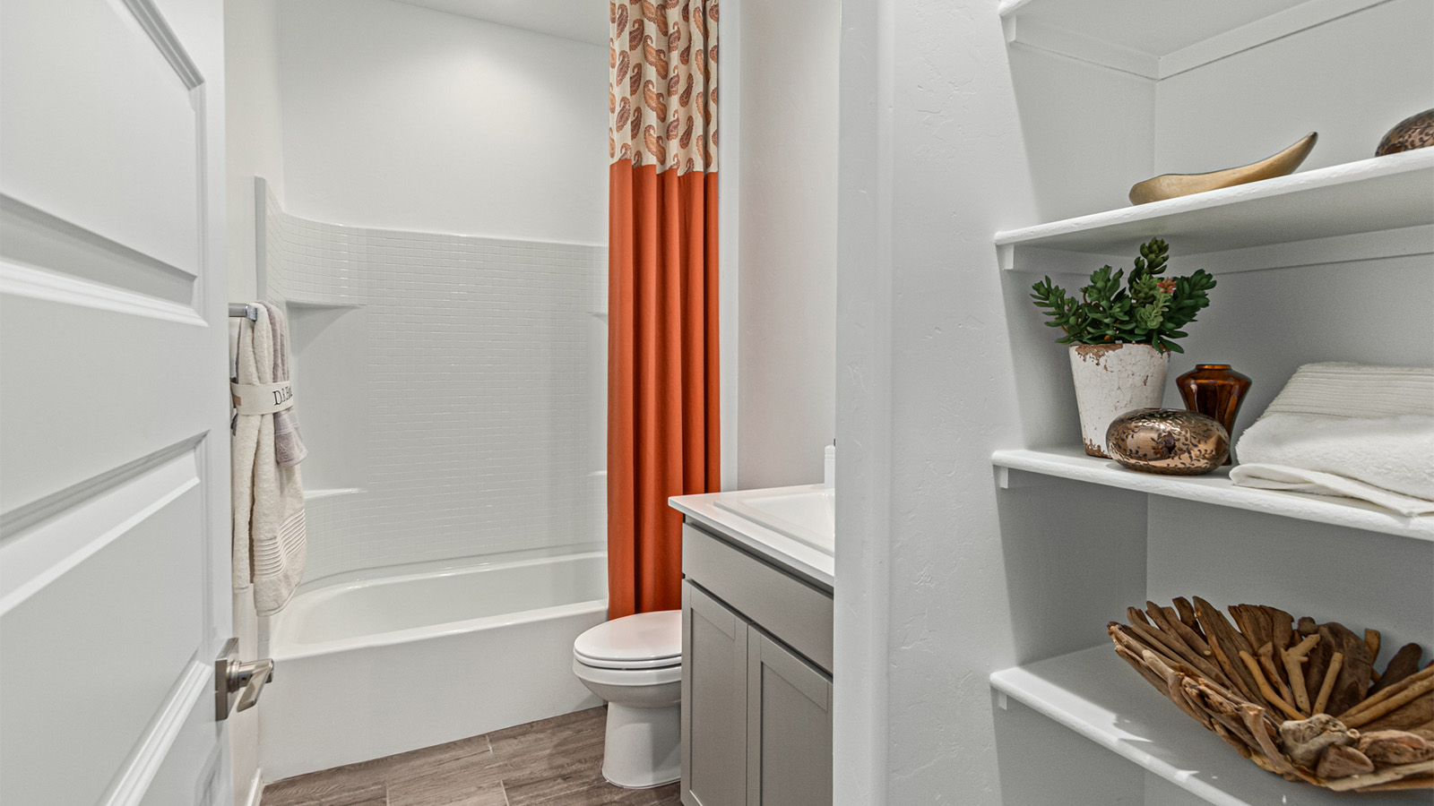 Welcome to the Kingston floor plan in the Agave neighborhood at Saguaro Bloom, Marana, Arizona—a perfect blend of comfort, modern living, and energy efficiency. This thoughtfully crafted one-story home spans 2,051 square feet and offers four bedrooms and two bathrooms, ideal for families of all sizes.  The open-concept design features a spacious great room that effortlessly connects with the kitchen and dining area, creating an inviting central hub for everyday living and entertaining. The kitchen is equipped with contemporary appliances and a pantry.  The primary bedroom, located at the rear of the home, provides a peaceful retreat with a private ensuite bathroom and a walk-in closet. The additional three bedrooms are positioned at the front of the house, offering versatility for use as guest rooms, a home office, or children’s bedrooms. Step outside to the covered patio, a perfect spot to enjoy the beautiful Arizona weather.  Built with energy efficiency as a priority, the Kingston includes smart home technology, which not only simplifies daily living but also helps reduce utility costs. A two-car garage provides ample parking and additional storage space, enhancing the home’s functionality.  Residents of Saguaro Bloom enjoy access to a range of community amenities, including parks, walking trails, and recreational facilities, making this home an ideal choice for those seeking a balanced lifestyle in a scenic setting.