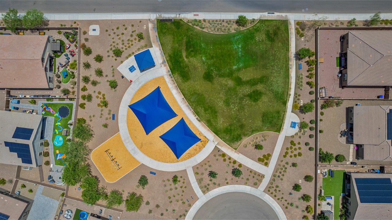 The Rosemont at Agave in Saguaro Bloom, Marana, AZ, is the largest floorplan available in this distinctive neighborhood and the only one of its kind offered throughout Tucson, Marana, Vail, and Sahuarita. This spacious two-story home spans 2,738 square feet and is designed to accommodate modern living with ample room for everyone. Featuring five bedrooms and three bathrooms, this plan offers a perfect balance of private retreats and shared spaces, ensuring comfort and functionality for families of all sizes.  Upon entering, you are welcomed by a generous great room that flows effortlessly into the dining room and kitchen, creating a cohesive space ideal for entertaining or family gatherings. The kitchen is well-equipped with stainless steel appliances, a large island with seating, and a pantry that provides abundant storage. Just off the kitchen, the covered patio offers a seamless transition to outdoor living, perfect for Arizona's mild evenings.  The first floor includes a secondary bedroom and bathroom, providing a private space for guests or an ideal home office. The primary suite, located on the ground floor, features a walk-in closet and an en suite bathroom complete with dual sinks and a spacious shower.  Upstairs, the second floor offers three additional bedrooms, each with ample closet space, and a game room or loft that can be customized to suit your lifestyle—whether it’s a playroom, media center, or home gym. A third bathroom and additional storage space round out the upstairs features, ensuring that everyone has their own space.  Standard features include quartz countertops in the kitchen and bathrooms, wood-look tile flooring in common areas, and shaker-style cabinets. The home is also equipped with the Home is Connected® Smart Home package, which includes keyless entry, a smart thermostat, a video doorbell and more, ensuring convenience and peace of mind.  The Rosemont at Agave is a unique opportunity to enjoy luxury, space, and modern conveniences in one of Marana’s most sought-after communities.