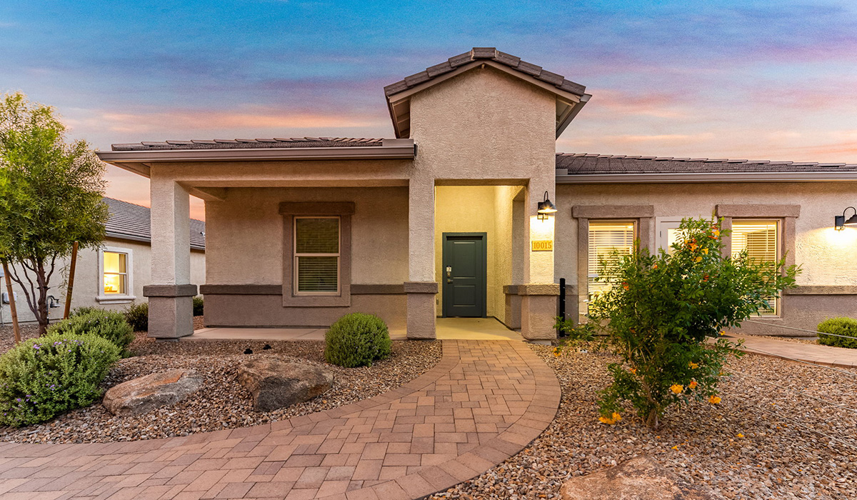 Explore New Homes at Saguaro Bloom by D.R. Horton – A Master-Planned Community in Marana, AZ. Nestled in the foothills of the breathtaking Tucson Mountains, Saguaro Bloom by D.R. Horton is a premier master-planned community in Northwest Marana that offers an exceptional living experience. Saguaro Bloom is divided into distinct neighborhoods, each offering its unique charm and amenities.  *Mesquite at Saguaro Bloom* is located in Block 1 and offers a variety of spacious floorplans with 18x18 tile flooring, granite countertops in kitchen and bathrooms, and Shaker-style cabinets in white or gray. These homes feature 9’ ceilings on the first floor, island kitchens, and the Home is Connected® Smart Home package, making them perfect for modern living.  *Agave at Saguaro Bloom*, situated in Block 7C, features homes with stunning 6x36” wood-look tile in gray, quartz countertops in kitchen and bathrooms, and Shaker-style cabinets. These homes are designed with stylish interiors and modern conveniences, including LED disc lighting and energy-efficient tankless water heaters.  *Cholla Ridge at Saguaro Bloom*, located in Block 7B, offers single-story homes on lots with no rear neighbors. These homes are distinguished by beautiful 12x24” tile flooring, gourmet kitchens, and 10’ ceilings in select homes. With 8’ sliding glass patio doors and super showers, Cholla Ridge combines luxury and privacy in a serene setting.  All homes in Saguaro Bloom are built with a Spanish lace stucco exterior, tile roofs, landscaped front yards with auto drip irrigation, and large, fully fenced backyards ready for your design. The homes also include covered front porches and back patios, stainless steel gas appliances, and executive height vanities in all bathrooms. Additionally, as of August 2024, all homes starting production are Zero Energy Ready, meeting rigorous energy efficiency standards that significantly reduce energy costs and environmental impact.  Residents of Saguaro Bloom enjoy an array of community amenities, including a clubhouse, two pools with lap lanes and lagoon entry, a fitness center, a splash pad, and over 30 miles of walking trails. The community also features more than 20 pocket parks, playgrounds, and coming soon, a large community park with tennis, pickleball, soccer, baseball, and a dog park. Saguaro Bloom is truly a lifestyle community, offering regular events like Food Truck Thursdays, Movies at the Pool, and holiday decorating contests, all fostering a strong sense of community.  Located in the highly-rated Marana Unified School District, Saguaro Bloom is close to excellent schools, including Rattlesnake Ridge Elementary, Marana Middle School, and Marana High School. The community’s location offers a perfect balance of seclusion and convenience, with quick access to I-10, grocery stores, restaurants, and the Twin Peaks Outlet, all within minutes. Downtown Tucson, with its vibrant arts, culture, and entertainment scene, is just a short 15-minute drive away.  Surrounded by the natural beauty of the desert landscape, residents can explore nearby outdoor attractions like Saguaro National Park West, the Arizona Desert Museum, and Quarry Pines Golf Course. Whether you enjoy hiking, biking, or simply taking in the stunning views, Saguaro Bloom offers an unparalleled lifestyle in one of Arizona’s most sought-after locations.  Discover the perfect blend of modern amenities, scenic beauty, and a strong sense of community at Saguaro Bloom by D.R. Horton – where your new home awaits in Marana, AZ.
