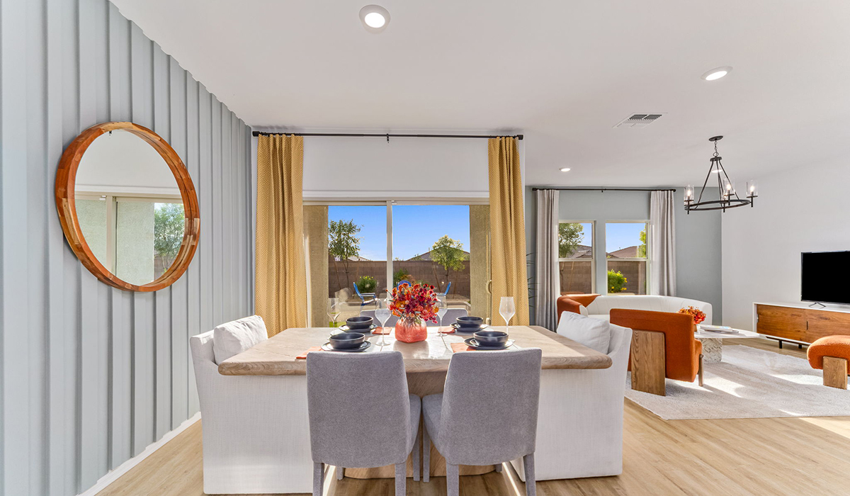Explore New Homes at Saguaro Bloom by D.R. Horton – A Master-Planned Community in Marana, AZ. Nestled in the foothills of the breathtaking Tucson Mountains, Saguaro Bloom by D.R. Horton is a premier master-planned community in Northwest Marana that offers an exceptional living experience. Saguaro Bloom is divided into distinct neighborhoods, each offering its unique charm and amenities.  *Mesquite at Saguaro Bloom* is located in Block 1 and offers a variety of spacious floorplans with 18x18 tile flooring, granite countertops in kitchen and bathrooms, and Shaker-style cabinets in white or gray. These homes feature 9’ ceilings on the first floor, island kitchens, and the Home is Connected® Smart Home package, making them perfect for modern living.  *Agave at Saguaro Bloom*, situated in Block 7C, features homes with stunning 6x36” wood-look tile in gray, quartz countertops in kitchen and bathrooms, and Shaker-style cabinets. These homes are designed with stylish interiors and modern conveniences, including LED disc lighting and energy-efficient tankless water heaters.  *Cholla Ridge at Saguaro Bloom*, located in Block 7B, offers single-story homes on lots with no rear neighbors. These homes are distinguished by beautiful 12x24” tile flooring, gourmet kitchens, and 10’ ceilings in select homes. With 8’ sliding glass patio doors and super showers, Cholla Ridge combines luxury and privacy in a serene setting.  All homes in Saguaro Bloom are built with a Spanish lace stucco exterior, tile roofs, landscaped front yards with auto drip irrigation, and large, fully fenced backyards ready for your design. The homes also include covered front porches and back patios, stainless steel gas appliances, and executive height vanities in all bathrooms. Additionally, as of August 2024, all homes starting production are Zero Energy Ready, meeting rigorous energy efficiency standards that significantly reduce energy costs and environmental impact.  Residents of Saguaro Bloom enjoy an array of community amenities, including a clubhouse, two pools with lap lanes and lagoon entry, a fitness center, a splash pad, and over 30 miles of walking trails. The community also features more than 20 pocket parks, playgrounds, and coming soon, a large community park with tennis, pickleball, soccer, baseball, and a dog park. Saguaro Bloom is truly a lifestyle community, offering regular events like Food Truck Thursdays, Movies at the Pool, and holiday decorating contests, all fostering a strong sense of community.  Located in the highly-rated Marana Unified School District, Saguaro Bloom is close to excellent schools, including Rattlesnake Ridge Elementary, Marana Middle School, and Marana High School. The community’s location offers a perfect balance of seclusion and convenience, with quick access to I-10, grocery stores, restaurants, and the Twin Peaks Outlet, all within minutes. Downtown Tucson, with its vibrant arts, culture, and entertainment scene, is just a short 15-minute drive away.  Surrounded by the natural beauty of the desert landscape, residents can explore nearby outdoor attractions like Saguaro National Park West, the Arizona Desert Museum, and Quarry Pines Golf Course. Whether you enjoy hiking, biking, or simply taking in the stunning views, Saguaro Bloom offers an unparalleled lifestyle in one of Arizona’s most sought-after locations.  Discover the perfect blend of modern amenities, scenic beauty, and a strong sense of community at Saguaro Bloom by D.R. Horton – where your new home awaits in Marana, AZ.