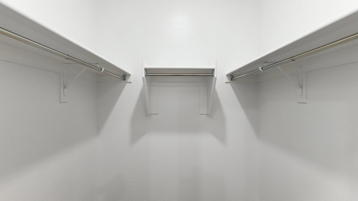 The Garland floor plan is a spacious single-story new home situated in the Agave neighborhood at Saguaro Bloom, offering 2,273 square feet of well-planned living space that perfectly suits a variety of lifestyles. This home features four bedrooms and three full bathrooms making it an ideal choice for families and those needing room to grow. As you step into the front porch and through the front door, you're greeted by the open concept layout with a seamless flow between the living, dining, and kitchen area, ensuring that every part of the home feels connected. The kitchen, equipped with a central island, quartz countertops, and your choice of flat panel Shaker-style cabinet doors with multiple color options available. A walk-in pantry provides additional storage, making it easy to keep everything organized.  The Garland's four bedrooms are thoughtfully arranged to provide both privacy and convenience. The primary suite is tucked away at the rear of the home, offering a private retreat with walk-in closets off the en-suite bathroom complete with an optional dual sink vanity. The additional bedrooms are strategically placed near the front and center of the home, each with access to a full bathroom, ensuring comfort for all family members or guests.  The large great room serves as the central gathering space, perfect for family activities or entertaining guests. Adjacent to the great room is a covered patio, extending your living space outdoors and offering a perfect spot to enjoy the serene surroundings of Saguaro Bloom.  Practical features like a dedicated utility room and a spacious three-car garage enhance the functionality of this home, while large windows ensure that natural light fills the space, creating a bright and inviting atmosphere.  Located within the vibrant Saguaro Bloom community, residents of The Garland can take advantage of a wide array of amenities, from resort-style pools to extensive walking trails. This home offers a unique opportunity to enjoy both comfort and community in one of Marana’s most sought-after neighborhoods.