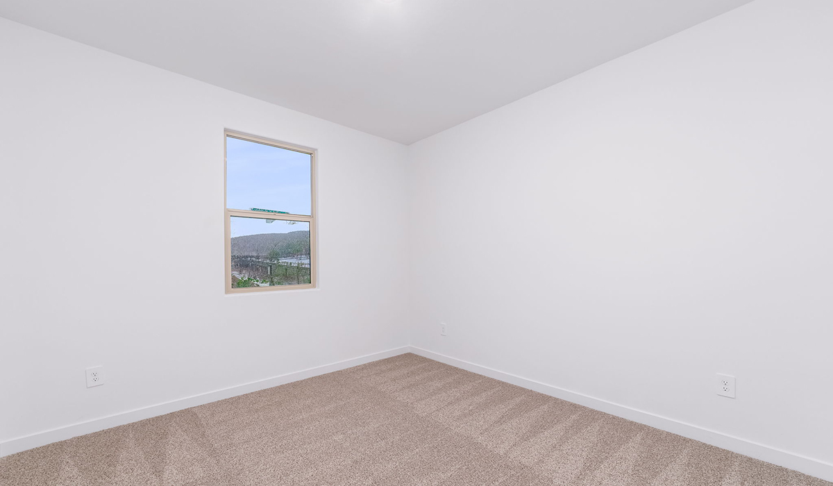 The Garland is a spacious single-story new home situated in the Agave neighborhood at Saguaro Bloom, offering 2,273 square feet of well-planned living. This home features four bedrooms and three full bathrooms making it an ideal choice for families and those needing room to grow.  As you enter through the porch and into the front door, you're greeted by the open concept layout with a seamless flow between the living, dining, and kitchen area. The kitchen features a large central island, quartz countertops, and your choice of flat panel Shaker-style cabinet doors with multiple color options available. A walk-in pantry provides additional storage, making it easy to keep everything organized.  The Garland's four bedrooms are thoughtfully arranged to provide both privacy and convenience. The primary suite is tucked away at the rear of the home, offering a private retreat with walk-in closets off the en-suite bathroom complete with an optional dual sink vanity. The additional bedrooms are strategically placed near the front and center of the home, each with access to a full bathroom, ensuring comfort for all family members or guests.  The large great room serves as the central gathering space, perfect for family activities or entertaining guests. Adjacent to the great room is a covered patio, extending your living space outdoors and offering a perfect spot to enjoy the serene surroundings of Saguaro Bloom.  Practical features like a dedicated utility room and a spacious three-car garage enhance the functionality of this home, while large windows ensure that natural light fills the space, creating a bright and inviting atmosphere.  Located within the vibrant Saguaro Bloom community, residents of The Garland can take advantage of a wide array of amenities, from resort-style pools to extensive walking trails. This home offers a unique opportunity to enjoy both comfort and community in one of Marana’s most sought-after neighborhoods.  *Images shown are for reference only. They depict the Garland floor plan and may not represent the actual home.