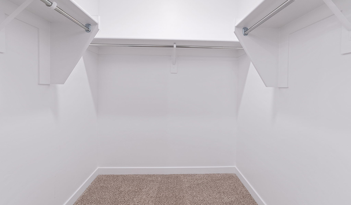 The Garland is a spacious single-story new home situated in the Agave neighborhood at Saguaro Bloom, offering 2,273 square feet of well-planned living. This home features four bedrooms and three full bathrooms making it an ideal choice for families and those needing room to grow.  As you enter through the porch and into the front door, you're greeted by the open concept layout with a seamless flow between the living, dining, and kitchen area. The kitchen features a large central island, quartz countertops, and your choice of flat panel Shaker-style cabinet doors with multiple color options available. A walk-in pantry provides additional storage, making it easy to keep everything organized.  The Garland's four bedrooms are thoughtfully arranged to provide both privacy and convenience. The primary suite is tucked away at the rear of the home, offering a private retreat with walk-in closets off the en-suite bathroom complete with an optional dual sink vanity. The additional bedrooms are strategically placed near the front and center of the home, each with access to a full bathroom, ensuring comfort for all family members or guests.  The large great room serves as the central gathering space, perfect for family activities or entertaining guests. Adjacent to the great room is a covered patio, extending your living space outdoors and offering a perfect spot to enjoy the serene surroundings of Saguaro Bloom.  Practical features like a dedicated utility room and a spacious three-car garage enhance the functionality of this home, while large windows ensure that natural light fills the space, creating a bright and inviting atmosphere.  Located within the vibrant Saguaro Bloom community, residents of The Garland can take advantage of a wide array of amenities, from resort-style pools to extensive walking trails. This home offers a unique opportunity to enjoy both comfort and community in one of Marana’s most sought-after neighborhoods.  *Images shown are for reference only. They depict the Garland floor plan and may not represent the actual home.