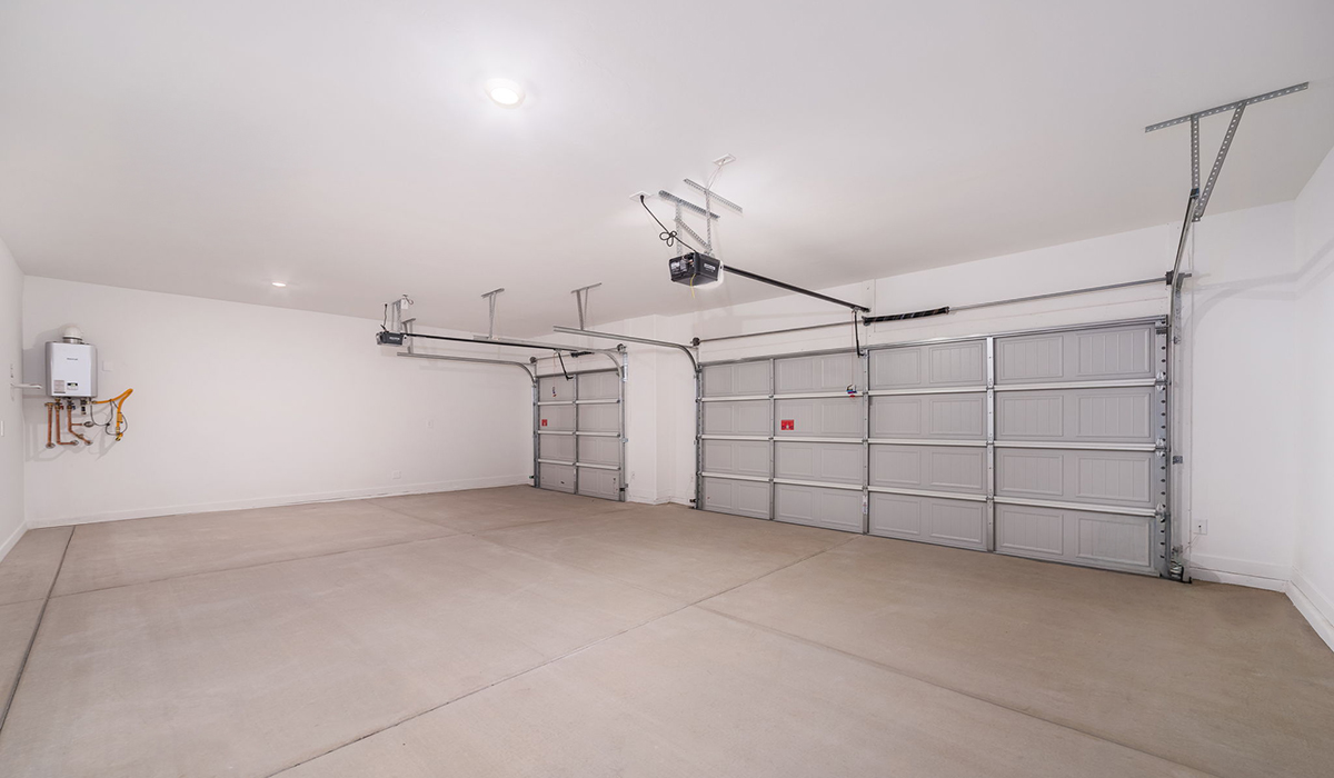 The Garland is a spacious single-story new home situated in the Agave neighborhood at Saguaro Bloom, offering 2,273 square feet of well-planned living. This home features four bedrooms and three full bathrooms making it an ideal choice for families and those needing room to grow.  As you enter through the porch and into the front door, you're greeted by the open concept layout with a seamless flow between the living, dining, and kitchen area. The kitchen features a large central island, quartz countertops, and your choice of flat panel Shaker-style cabinet doors with multiple color options available. A walk-in pantry provides additional storage, making it easy to keep everything organized.  The Garland's four bedrooms are thoughtfully arranged to provide both privacy and convenience. The primary suite is tucked away at the rear of the home, offering a private retreat with walk-in closets off the en-suite bathroom complete with an optional dual sink vanity. The additional bedrooms are strategically placed near the front and center of the home, each with access to a full bathroom, ensuring comfort for all family members or guests.  The large great room serves as the central gathering space, perfect for family activities or entertaining guests. Adjacent to the great room is a covered patio, extending your living space outdoors and offering a perfect spot to enjoy the serene surroundings of Saguaro Bloom.  Practical features like a dedicated utility room and a spacious three-car garage enhance the functionality of this home, while large windows ensure that natural light fills the space, creating a bright and inviting atmosphere.  Located within the vibrant Saguaro Bloom community, residents of The Garland can take advantage of a wide array of amenities, from resort-style pools to extensive walking trails. This home offers a unique opportunity to enjoy both comfort and community in one of Marana’s most sought-after neighborhoods.  *Images shown are for reference only. They depict the Garland floor plan and may not represent the actual home.