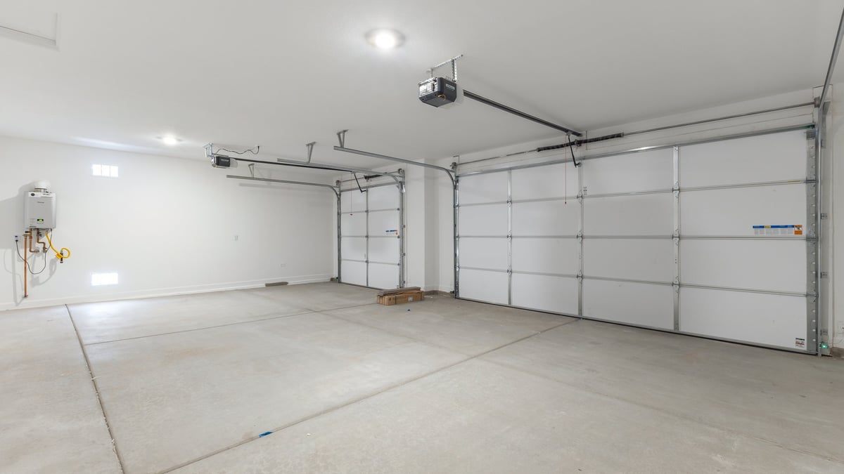 The Garland is a spacious single-story new home situated in the Agave neighborhood at Saguaro Bloom, offering 2,273 square feet of well-planned living. This home features four bedrooms and three full bathrooms making it an ideal choice for families and those needing room to grow.  As you enter through the porch and into the front door, you're greeted by the open concept layout with a seamless flow between the living, dining, and kitchen area. The kitchen features a large central island, quartz countertops, and your choice of flat panel Shaker-style cabinet doors with multiple color options available. A walk-in pantry provides additional storage, making it easy to keep everything organized.  The Garland's four bedrooms are thoughtfully arranged to provide both privacy and convenience. The primary suite is tucked away at the rear of the home, offering a private retreat with walk-in closets off the en-suite bathroom complete with an optional dual sink vanity. The additional bedrooms are strategically placed near the front and center of the home, each with access to a full bathroom, ensuring comfort for all family members or guests.  The large great room serves as the central gathering space, perfect for family activities or entertaining guests. Adjacent to the great room is a covered patio, extending your living space outdoors and offering a perfect spot to enjoy the serene surroundings of Saguaro Bloom.  Practical features like a dedicated utility room and a spacious three-car garage enhance the functionality of this home, while large windows ensure that natural light fills the space, creating a bright and inviting atmosphere.  Located within the vibrant Saguaro Bloom community, residents of The Garland can take advantage of a wide array of amenities, from resort-style pools to extensive walking trails. This home offers a unique opportunity to enjoy both comfort and community in one of Marana’s most sought-after neighborhoods.