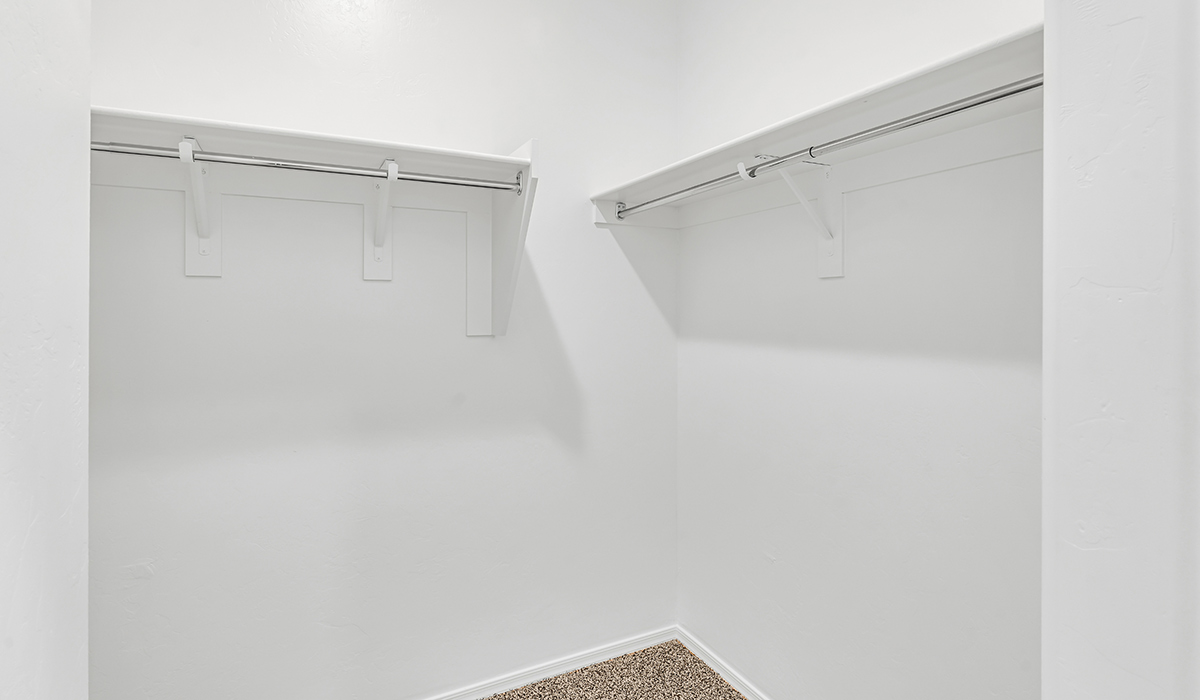 Welcome to The Amber, a thoughtfully designed single-story new home nestled in the Mesquite neighborhood at Saguaro Bloom, a master-planned community in Marana, Arizona. With 1,331 square feet of efficient living space, The Amber is perfect for those seeking a cozy yet functional home.  Step into a welcoming entryway that immediately introduces you to the home’s smart layout. The open design maximizes every square foot, with the heart of the home being the expansive great room, which flows seamlessly into the dining area and kitchen. The kitchen is well-equipped with a central island, granite countertops, and Shaker-style cabinets in either white or gray, offering a clean and modern aesthetic. A dedicated walk-in pantry adds extra storage, ensuring that all your culinary essentials are within reach.  The Amber offers three comfortable bedrooms, providing ample space for rest and relaxation. The primary suite is situated at the rear of the home, providing a sense of privacy. It includes a walk-in closet and an en-suite bathroom that features all the essentials for convenience. The two additional bedrooms are thoughtfully placed near the front of the home, sharing access to a full bathroom, making this layout perfect for families, guests, or a home office.  Practicality meets comfort in this home, with a utility room conveniently located near the kitchen and garage, providing easy access to the laundry area and additional storage. The Amber also includes a covered patio that extends the living space outdoors, ideal for enjoying Arizona’s beautiful weather.  The Amber is located in the vibrant Saguaro Bloom community, residents enjoy access to a wide range of amenities, from swimming pools and parks to miles of scenic walking trails. Whether you’re a first-time homebuyer or looking to downsize, The Amber offers a perfect blend of comfort, style, and convenience in one of Marana’s most desirable neighborhoods.  *Images shown are for reference only. They depict the Amber model home and may not represent the actual home.