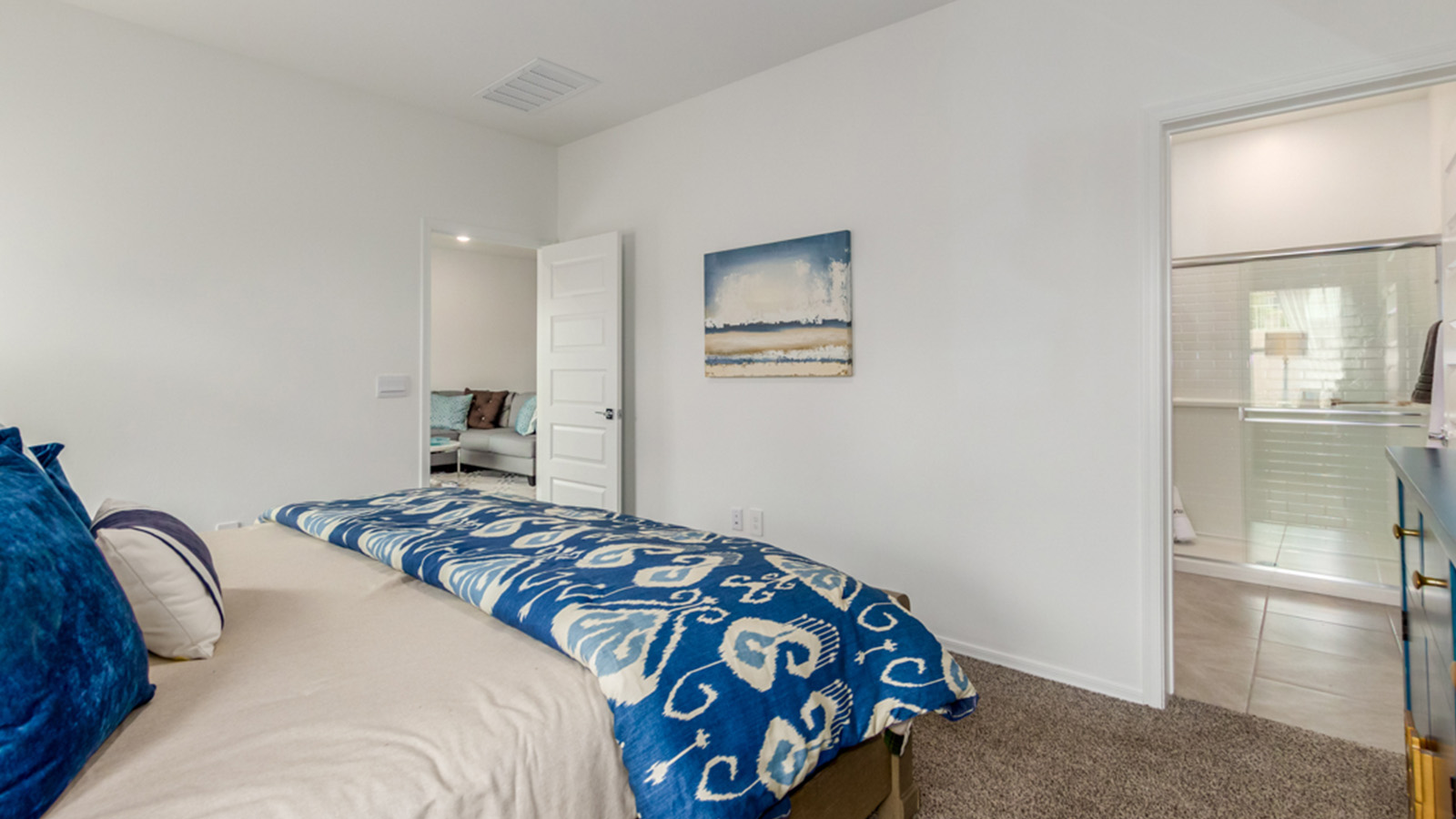 Welcome to The Amber, a thoughtfully designed single-story new home nestled in the Mesquite neighborhood at Saguaro Bloom, a master-planned community in Marana, Arizona. With 1,331 square feet of efficient living space, The Amber is perfect for those seeking a cozy yet functional home.  Step into a welcoming entryway that immediately introduces you to the home’s smart layout. The open design maximizes every square foot, with the heart of the home being the expansive great room, which flows seamlessly into the dining area and kitchen. The kitchen is well-equipped with a central island, granite countertops, and Shaker-style cabinets in either white or gray, offering a clean and modern aesthetic. A dedicated walk-in pantry adds extra storage, ensuring that all your culinary essentials are within reach.  The Amber offers three comfortable bedrooms, providing ample space for rest and relaxation. The primary suite is situated at the rear of the home, providing a sense of privacy. It includes a walk-in closet and an en-suite bathroom that features all the essentials for convenience. The two additional bedrooms are thoughtfully placed near the front of the home, sharing access to a full bathroom, making this layout perfect for families, guests, or a home office.  Practicality meets comfort in this home, with a utility room conveniently located near the kitchen and garage, providing easy access to the laundry area and additional storage. The Amber also includes a covered patio that extends the living space outdoors, ideal for enjoying Arizona’s beautiful weather.  The Amber is not just a home; it’s a lifestyle. Located in the vibrant Saguaro Bloom community, residents enjoy access to a wide range of amenities, from swimming pools and parks to miles of scenic walking trails. Whether you’re a first-time homebuyer or looking to downsize, The Amber offers a perfect blend of comfort, style, and convenience in one of Marana’s most desirable neighborhoods.