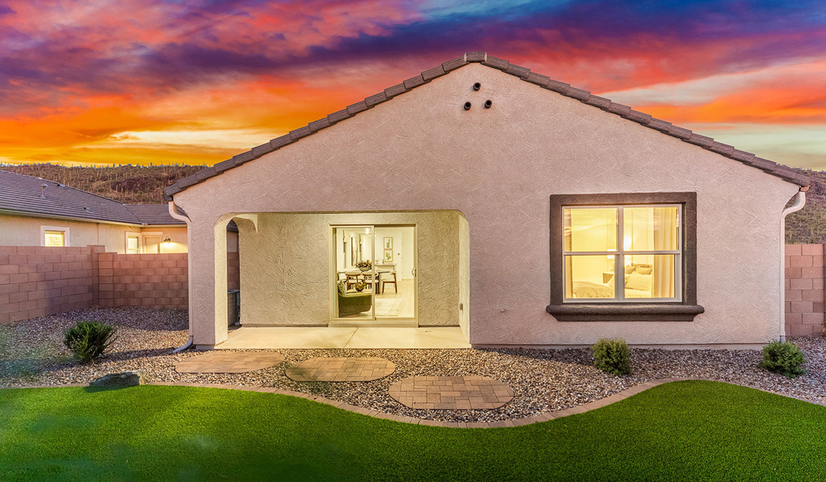 Welcome to The Caroline, the newest floor plan available at Saguaro Bloom by D.R. Horton in Marana, Arizona. This single-story new home is 1,536 square feet and is thoughtfully planned out throughout the living spaces. The Caroline offers three bedrooms and two bathrooms, making it ideal for families who value both space and convenience.  As you enter through the inviting covered porch, you’re greeted by a bright and airy entryway that flows into the heart of the home. The expansive great room, dining area, and kitchen are thoughtfully connected, creating an intimate space. The kitchen features a large island, laminate countertops, Shaker-style cabinetry, spacious pantry, and modern stainless-steel appliances ensure your kitchen is both functional and stylish.  The Caroline’s layout includes a generously sized primary bedroom, carefully positioned for privacy at the rear of the home. This room features a large walk-in closet and an en-suite bathroom. The additional two bedrooms are well-sized and located in separate areas of the home with easy access to the main full bathroom.  The covered patio, accessible from the great room, offers a perfect spot for outdoor living, where you can enjoy Arizona’s beautiful weather throughout the year. Designed with practicality in mind, this floorplan includes a two-car garage with an option for a third, a utility room with washer and dryer connections, and additional storage space.  The Caroline is designed with energy efficiency in mind. This DOE Zero Energy Ready Home offers a sustainable lifestyle with advanced features like tankless water heaters, energy-efficient LED lighting, and high-performance insulation, ensuring lower utility costs and a reduced environmental footprint.  Living in Saguaro Bloom provides residents with access to top-rated schools, community parks, scenic walking trails, and resort like amenities. This vibrant neighborhood is the perfect setting for those looking to enjoy the best of Arizona living.  *Images shown are for reference only. They depict The Caroline sales model home and may not represent the actual home.