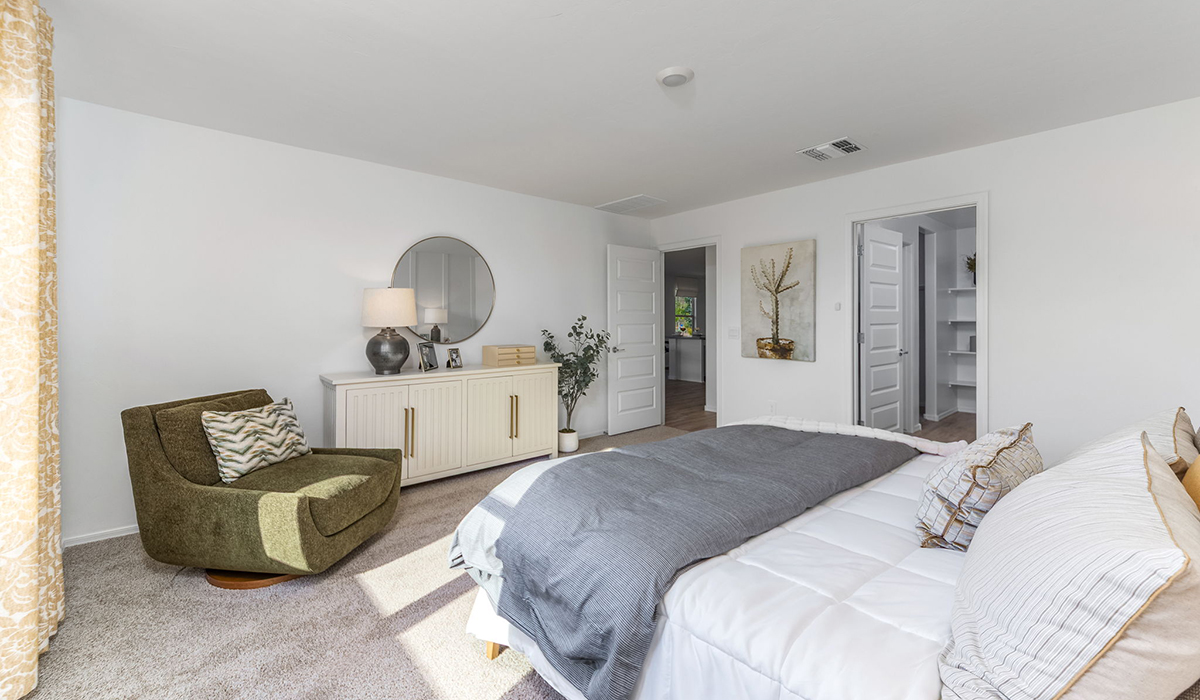 Welcome to The Caroline, the newest floor plan available at Saguaro Bloom by D.R. Horton in Marana, Arizona. This single-story new home is 1,536 square feet and is thoughtfully planned out throughout the living spaces. The Caroline offers three bedrooms and two bathrooms, making it ideal for families who value both space and convenience.  As you enter through the inviting covered porch, you’re greeted by a bright and airy entryway that flows into the heart of the home. The expansive great room, dining area, and kitchen are thoughtfully connected, creating an intimate space. The kitchen features a large island, laminate countertops, Shaker-style cabinetry, spacious pantry, and modern stainless-steel appliances ensure your kitchen is both functional and stylish.  The Caroline’s layout includes a generously sized primary bedroom, carefully positioned for privacy at the rear of the home. This room features a large walk-in closet and an en-suite bathroom. The additional two bedrooms are well-sized and located in separate areas of the home with easy access to the main full bathroom.  The covered patio, accessible from the great room, offers a perfect spot for outdoor living, where you can enjoy Arizona’s beautiful weather throughout the year. Designed with practicality in mind, this floorplan includes a two-car garage with an option for a third, a utility room with washer and dryer connections, and additional storage space.  The Caroline is designed with energy efficiency in mind. This DOE Zero Energy Ready Home offers a sustainable lifestyle with advanced features like tankless water heaters, energy-efficient LED lighting, and high-performance insulation, ensuring lower utility costs and a reduced environmental footprint.  Living in Saguaro Bloom provides residents with access to top-rated schools, community parks, scenic walking trails, and resort like amenities. This vibrant neighborhood is the perfect setting for those looking to enjoy the best of Arizona living.  *Images shown are for reference only. They depict the Caroline model home and may not represent the actual home.