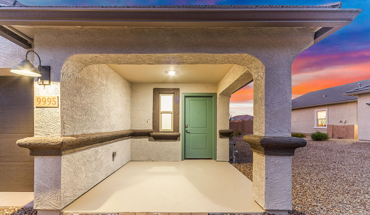 Welcome to The Caroline, the newest floor plan available at Saguaro Bloom by D.R. Horton in Marana, Arizona. This single-story new home is 1,536 square feet and is thoughtfully planned out throughout the living spaces. The Caroline offers three bedrooms and two bathrooms, making it ideal for families who value both space and convenience.  As you enter through the inviting covered porch, you’re greeted by a bright and airy entryway that flows into the heart of the home. The expansive great room, dining area, and kitchen are thoughtfully connected, creating an intimate space. The kitchen features a large island, laminate countertops, Shaker-style cabinetry, spacious pantry, and modern stainless-steel appliances ensure your kitchen is both functional and stylish.  The Caroline’s layout includes a generously sized primary bedroom, carefully positioned for privacy at the rear of the home. This room features a large walk-in closet and an en-suite bathroom. The additional two bedrooms are well-sized and located in separate areas of the home with easy access to the main full bathroom.  The covered patio, accessible from the great room, offers a perfect spot for outdoor living, where you can enjoy Arizona’s beautiful weather throughout the year. Designed with practicality in mind, this floorplan includes a two-car garage with an option for a third, a utility room with washer and dryer connections, and additional storage space.  The Caroline is designed with energy efficiency in mind. This DOE Zero Energy Ready Home offers a sustainable lifestyle with advanced features like tankless water heaters, energy-efficient LED lighting, and high-performance insulation, ensuring lower utility costs and a reduced environmental footprint.  Living in Saguaro Bloom provides residents with access to top-rated schools, community parks, scenic walking trails, and resort like amenities. This vibrant neighborhood is the perfect setting for those looking to enjoy the best of Arizona living.