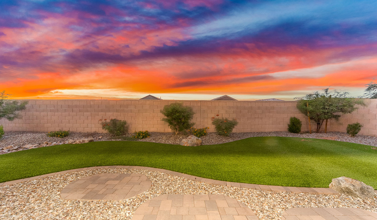 Welcome to The Caroline, the newest floor plan available at Saguaro Bloom by D.R. Horton in Marana, Arizona. This single-story new home is 1,536 square feet and is thoughtfully planned out throughout the living spaces. The Caroline offers three bedrooms and two bathrooms, making it ideal for families who value both space and convenience.  As you enter through the inviting covered porch, you’re greeted by a bright and airy entryway that flows into the heart of the home. The expansive great room, dining area, and kitchen are thoughtfully connected, creating an intimate space. The kitchen features a large island, quartz countertops, Shaker-style cabinetry, spacious pantry, and modern stainless-steel appliances ensure your kitchen is both functional and stylish.  The Caroline’s layout includes a generously sized primary bedroom, carefully positioned for privacy at the rear of the home. This room features a large walk-in closet and an en-suite bathroom. The additional two bedrooms are well-sized and located in separate areas of the home with easy access to the main full bathroom.  The covered patio, accessible from the great room, offers a perfect spot for outdoor living, where you can enjoy Arizona’s beautiful weather throughout the year. Designed with practicality in mind, this floorplan includes a two-car garage with an option for a third, a utility room with washer and dryer connections, and additional storage space.  The Caroline is designed with energy efficiency in mind. This DOE Zero Energy Ready Home offers a sustainable lifestyle with advanced features like tankless water heaters, energy-efficient LED lighting, and high-performance insulation, ensuring lower utility costs and a reduced environmental footprint.  Living in Saguaro Bloom provides residents with access to top-rated schools, community parks, scenic walking trails, and resort like amenities. This vibrant neighborhood is the perfect setting for those looking to enjoy the best of Arizona living.