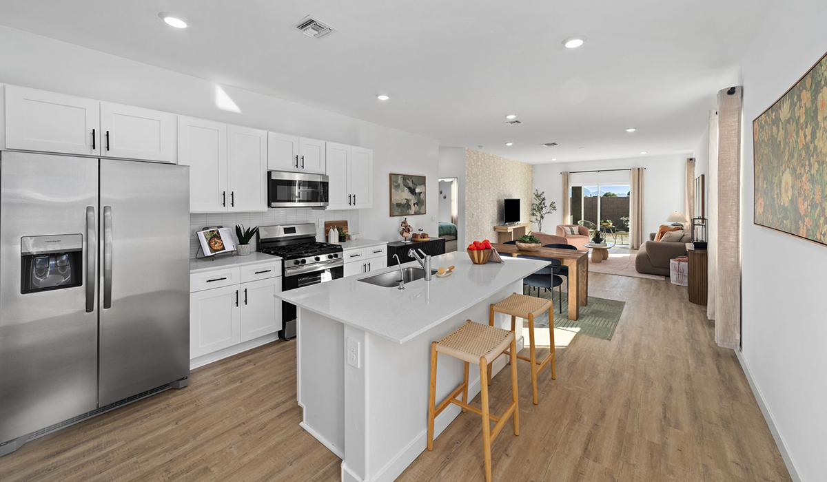 Welcome to The Carolina, a new floor plan available at Saguaro Bloom by D.R. Horton in Marana, Arizona. This single-story floorplan offers 1,608 square feet and is thoughtfully planned out throughout the living spaces. The Carolina features three bedrooms and two bathrooms, making it ideal for those seeking value, space, and convenience.  As you enter through the inviting covered porch, you’re greeted by a bright and airy entryway that flows into the heart of the home. The expansive great room, dining area, and kitchen are thoughtfully connected, creating an ideal space for entertaining or enjoying time with family.  The Carolina’s layout includes a generously sized primary bedroom, carefully positioned for privacy at the rear of the home. This spacious room features a large walk-in closet and an en-suite bathroom. The additional two bedrooms are well-sized and located near the heart of the home with easy access to the main full bathroom.  The Carolina is designed with energy efficiency in mind and features a tankless water heater, energy-efficient LED lighting, and high-performance insulation, helping to lower utility costs. Additionally, this home is equipped with D.R. Horton’s Home is Connected Smart Home package, which includes a smart thermostat, video doorbell, keyless entry, and Wi-Fi® enabled garage door opener.  Step outside to a spacious backyard, where you can unwind and enjoy Tucson’s beautiful weather year-round. Whether you’re sipping your morning coffee or hosting a weekend barbecue, this outdoor space serene surroundings of Saguaro Bloom.  Residents of Saguaro Bloom enjoy an array of community amenities, including a clubhouse, two pools with lap lanes and lagoon entry, a fitness center, a splash pad, and over 30 miles of walking trails. The community also features more than 20 pocket parks, playgrounds, and coming soon, a large community park with tennis, pickleball, soccer, baseball, and a dog park.  Located in the highly-rated Marana Unified School District, Saguaro Bloom is close to excellent schools, including Rattlesnake Ridge Elementary, Marana Middle School, and Marana High School.  *Images shown are for reference only. They depict The Carolina sales model home and may not represent the actual home.