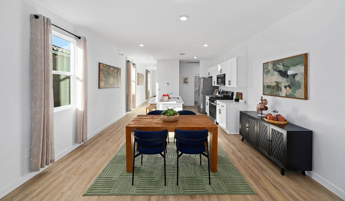 Welcome to The Carolina, a new floor plan available at Saguaro Bloom by D.R. Horton in Marana, Arizona. This single-story floorplan offers 1,608 square feet and is thoughtfully planned out throughout the living spaces. The Carolina features three bedrooms and two bathrooms, making it ideal for those seeking value, space, and convenience.  As you enter through the inviting covered porch, you’re greeted by a bright and airy entryway that flows into the heart of the home. The expansive great room, dining area, and kitchen are thoughtfully connected, creating an ideal space for entertaining or enjoying time with family.  The Carolina’s layout includes a generously sized primary bedroom, carefully positioned for privacy at the rear of the home. This spacious room features a large walk-in closet and an en-suite bathroom. The additional two bedrooms are well-sized and located near the heart of the home with easy access to the main full bathroom.  The Carolina is designed with energy efficiency in mind and features a tankless water heater, energy-efficient LED lighting, and high-performance insulation, helping to lower utility costs. Additionally, this home is equipped with D.R. Horton’s Home is Connected Smart Home package, which includes a smart thermostat, video doorbell, keyless entry, and Wi-Fi® enabled garage door opener.  Step outside to a spacious backyard, where you can unwind and enjoy Tucson’s beautiful weather year-round. Whether you’re sipping your morning coffee or hosting a weekend barbecue, this outdoor space serene surroundings of Saguaro Bloom.  Residents of Saguaro Bloom enjoy an array of community amenities, including a clubhouse, two pools with lap lanes and lagoon entry, a fitness center, a splash pad, and over 30 miles of walking trails. The community also features more than 20 pocket parks, playgrounds, and coming soon, a large community park with tennis, pickleball, soccer, baseball, and a dog park.  Located in the highly-rated Marana Unified School District, Saguaro Bloom is close to excellent schools, including Rattlesnake Ridge Elementary, Marana Middle School, and Marana High School.  *Images shown are for reference only. They depict The Carolina sales model home and may not represent the actual home.