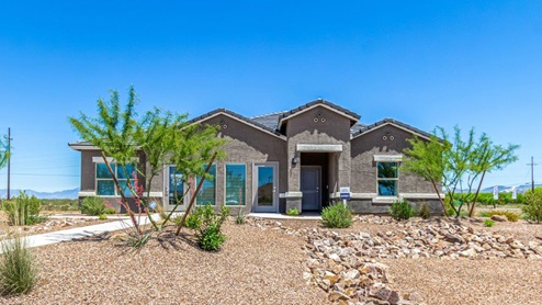 Welcome to Sahuarita Acres, where new homes by D.R. Horton offer the perfect blend of space, comfort, and modern convenience on expansive one-acre lots in the tranquil town of Sahuarita, Arizona. This unique community is designed for those who appreciate the luxury of space, with homes ranging from 1,900 to 2,600 square feet, each thoughtfully crafted with high-end finishes and features that cater to contemporary living. Sahuarita Acres provides a serene living experience with its spacious lots, perfect for creating your dream outdoor space. Whether you’re looking to park your RV, install a pool, or simply enjoy a large backyard, these one-acre homesites offer endless possibilities. The community also features walking trails that wind through the picturesque landscape, making it easy to enjoy the natural beauty of Sahuarita. Each home in Sahuarita Acres comes equipped with D.R. Horton’s Home is Connected® Smart Home package that includes a smart thermostat, video doorbell, keyless entry, a Wi-Fi-enabled garage door opener and more, ensuring that modern technology is at your fingertips. These new homes also new feature spray foam insulation for enhanced energy efficiency, RV parking with 30’ driveways, and three-car garages. Inside, you’ll find luxurious quartz countertops in the kitchens and bathrooms, 42” upper cabinets, dazzling wood-look tile flooring with thick 4 ¼ baseboards, and stainless steel appliances. These homes are also designed with energy efficiency in mind, meeting the stringent DOE Zero Energy Ready Home standards. This means your home is built to be so energy-efficient that a renewable energy system could offset most or all of the home's annual energy use, ensuring long-term savings and environmental benefits. Residents of Sahuarita Acres benefit from the peaceful, small-town charm of Sahuarita while still enjoying easy access to urban amenities. The community is just 30 minutes from downtown Tucson and only 15 miles from Davis-Monthan Air Force Base, making it an ideal location for those commuting to the city. Nearby, the Rancho Sahuarita shopping center offers a variety of dining and shopping options, including Fry’s, Dunkin’ Donuts, Starbucks, and more. Families will appreciate the excellent schools in the Sahuarita Unified School District, with Anza Trail Elementary, Anza Trail Middle School, and Walden Grove High School all located nearby. The community is also close to the popular Sahuarita Lake Park, which offers fishing, boating, and walking trails, providing ample opportunities for outdoor recreation. In addition to its scenic beauty and spacious homesites, Sahuarita Acres is close to several local attractions, including the Titan Missile Museum, Desert Diamond Casino, and the scenic Madera Canyon. Whether you’re looking to explore the outdoors or enjoy the quiet, laid-back vibe of Sahuarita, Sahuarita Acres offers a lifestyle that’s hard to match. Come home to Sahuarita Acres, where the perfect combination of space, luxury, and convenience awaits. Embrace the essence of Arizona living in this extraordinary community.