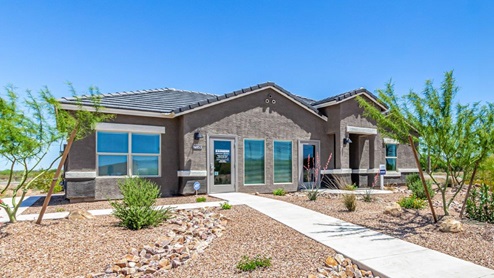 Welcome to Sahuarita Acres, where new homes by D.R. Horton offer the perfect blend of space, comfort, and modern convenience on expansive one-acre lots in the tranquil town of Sahuarita, Arizona. This unique community is designed for those who appreciate the luxury of space, with homes ranging from 1,900 to 2,600 square feet, each thoughtfully crafted with high-end finishes and features that cater to contemporary living. Sahuarita Acres provides a serene living experience with its spacious lots, perfect for creating your dream outdoor space. Whether you’re looking to park your RV, install a pool, or simply enjoy a large backyard, these one-acre homesites offer endless possibilities. The community also features walking trails that wind through the picturesque landscape, making it easy to enjoy the natural beauty of Sahuarita. Each home in Sahuarita Acres comes equipped with D.R. Horton’s Home is Connected® Smart Home package that includes a smart thermostat, video doorbell, keyless entry, a Wi-Fi-enabled garage door opener and more, ensuring that modern technology is at your fingertips. These new homes also new feature spray foam insulation for enhanced energy efficiency, RV parking with 30’ driveways, and three-car garages. Inside, you’ll find luxurious quartz countertops in the kitchens and bathrooms, 42” upper cabinets, dazzling wood-look tile flooring with thick 4 ¼ baseboards, and stainless steel appliances. These homes are also designed with energy efficiency in mind, meeting the stringent DOE Zero Energy Ready Home standards. This means your home is built to be so energy-efficient that a renewable energy system could offset most or all of the home's annual energy use, ensuring long-term savings and environmental benefits. Residents of Sahuarita Acres benefit from the peaceful, small-town charm of Sahuarita while still enjoying easy access to urban amenities. The community is just 30 minutes from downtown Tucson and only 15 miles from Davis-Monthan Air Force Base, making it an ideal location for those commuting to the city. Nearby, the Rancho Sahuarita shopping center offers a variety of dining and shopping options, including Fry’s, Dunkin’ Donuts, Starbucks, and more. Families will appreciate the excellent schools in the Sahuarita Unified School District, with Anza Trail Elementary, Anza Trail Middle School, and Walden Grove High School all located nearby. The community is also close to the popular Sahuarita Lake Park, which offers fishing, boating, and walking trails, providing ample opportunities for outdoor recreation. In addition to its scenic beauty and spacious homesites, Sahuarita Acres is close to several local attractions, including the Titan Missile Museum, Desert Diamond Casino, and the scenic Madera Canyon. Whether you’re looking to explore the outdoors or enjoy the quiet, laid-back vibe of Sahuarita, Sahuarita Acres offers a lifestyle that’s hard to match. Come home to Sahuarita Acres, where the perfect combination of space, luxury, and convenience awaits. Embrace the essence of Arizona living in this extraordinary community.