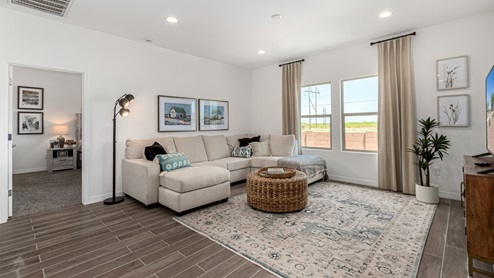 Welcome to Sahuarita Acres, where new homes by D.R. Horton offer the perfect blend of space, comfort, and modern convenience on expansive one-acre lots in the tranquil town of Sahuarita, Arizona. This unique community is designed for those who appreciate the luxury of space, with homes ranging from 1,900 to 2,600 square feet, each thoughtfully crafted with high-end finishes and features that cater to contemporary living. Sahuarita Acres provides a serene living experience with its spacious lots, perfect for creating your dream outdoor space. Whether you’re looking to park your RV, install a pool, or simply enjoy a large backyard, these one-acre homesites offer endless possibilities. The community also features walking trails that wind through the picturesque landscape, making it easy to enjoy the natural beauty of Sahuarita. Each home in Sahuarita Acres comes equipped with D.R. Horton’s Home is Connected® Smart Home package that includes a smart thermostat, video doorbell, keyless entry, a Wi-Fi-enabled garage door opener and more, ensuring that modern technology is at your fingertips. These new homes also new feature spray foam insulation for enhanced energy efficiency, RV parking with 30’ driveways, and three-car garages. Inside, you’ll find luxurious quartz countertops in the kitchens and bathrooms, 42” upper cabinets, dazzling wood-look tile flooring with thick 4 ¼ baseboards, and stainless steel appliances. These homes are also designed with energy efficiency in mind, meeting the stringent DOE Zero Energy Ready Home standards. This means your home is built to be so energy-efficient that a renewable energy system could offset most or all of the home's annual energy use, ensuring long-term savings and environmental benefits. Residents of Sahuarita Acres benefit from the peaceful, small-town charm of Sahuarita while still enjoying easy access to urban amenities. The community is just 30 minutes from downtown Tucson and only 15 miles from Davis-Monthan Air Force Base, making it an ideal location for those commuting to the city. Nearby, the Rancho Sahuarita shopping center offers a variety of dining and shopping options, including Fry’s, Dunkin’ Donuts, Starbucks, and more. Families will appreciate the excellent schools in the Sahuarita Unified School District, with Anza Trail Elementary, Anza Trail Middle School, and Walden Grove High School all located nearby. The community is also close to the popular Sahuarita Lake Park, which offers fishing, boating, and walking trails, providing ample opportunities for outdoor recreation. In addition to its scenic beauty and spacious homesites, Sahuarita Acres is close to several local attractions, including the Titan Missile Museum, Desert Diamond Casino, and the scenic Madera Canyon. Whether you’re looking to explore the outdoors or enjoy the quiet, laid-back vibe of Sahuarita, Sahuarita Acres offers a lifestyle that’s hard to match. Come home to Sahuarita Acres, where the perfect combination of space, luxury, and convenience awaits. Embrace the essence of Arizona living in this extraordinary community.