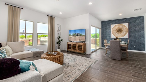 Welcome to Sahuarita Acres, where new homes by D.R. Horton offer the perfect blend of space, comfort, and modern convenience on expansive one-acre lots in the tranquil town of Sahuarita, Arizona. This unique community is designed for those who appreciate the luxury of space, with homes ranging from 1,900 to 2,600 square feet, each thoughtfully crafted with high-end finishes and features that cater to contemporary living. Sahuarita Acres provides a serene living experience with its spacious lots, perfect for creating your dream outdoor space. Whether you’re looking to park your RV, install a pool, or simply enjoy a large backyard, these one-acre homesites offer endless possibilities. The community also features walking trails that wind through the picturesque landscape, making it easy to enjoy the natural beauty of Sahuarita. Each home in Sahuarita Acres comes equipped with D.R. Horton’s Home is Connected® Smart Home package that includes a smart thermostat, video doorbell, keyless entry, a Wi-Fi-enabled garage door opener and more, ensuring that modern technology is at your fingertips. These new homes also new feature spray foam insulation for enhanced energy efficiency, RV parking with 30’ driveways, and three-car garages. Inside, you’ll find luxurious quartz countertops in the kitchens and bathrooms, 42” upper cabinets, dazzling wood-look tile flooring with thick 4 ¼ baseboards, and stainless steel appliances. These homes are also designed with energy efficiency in mind, meeting the stringent DOE Zero Energy Ready Home standards. This means your home is built to be so energy-efficient that a renewable energy system could offset most or all of the home's annual energy use, ensuring long-term savings and environmental benefits. Residents of Sahuarita Acres benefit from the peaceful, small-town charm of Sahuarita while still enjoying easy access to urban amenities. The community is just 30 minutes from downtown Tucson and only 15 miles from Davis-Monthan Air Force Base, making it an ideal location for those commuting to the city. Nearby, the Rancho Sahuarita shopping center offers a variety of dining and shopping options, including Fry’s, Dunkin’ Donuts, Starbucks, and more. Families will appreciate the excellent schools in the Sahuarita Unified School District, with Anza Trail Elementary, Anza Trail Middle School, and Walden Grove High School all located nearby. The community is also close to the popular Sahuarita Lake Park, which offers fishing, boating, and walking trails, providing ample opportunities for outdoor recreation. In addition to its scenic beauty and spacious homesites, Sahuarita Acres is close to several local attractions, including the Titan Missile Museum, Desert Diamond Casino, and the scenic Madera Canyon. Whether you’re looking to explore the outdoors or enjoy the quiet, laid-back vibe of Sahuarita, Sahuarita Acres offers a lifestyle that’s hard to match. Come home to Sahuarita Acres, where the perfect combination of space, luxury, and convenience awaits. Embrace the essence of Arizona living in this extraordinary community.