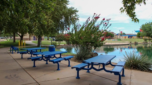 Welcome to Sahuarita Acres, where new homes by D.R. Horton offer the perfect blend of space, comfort, and modern convenience on expansive one-acre lots in the tranquil town of Sahuarita, Arizona. This unique community is designed for those who appreciate the luxury of space, with homes ranging from 1,900 to 2,600 square feet, each thoughtfully crafted with high-end finishes and features that cater to contemporary living. Sahuarita Acres provides a serene living experience with its spacious lots, perfect for creating your dream outdoor space. Whether you’re looking to park your RV, install a pool, or simply enjoy a large backyard, these one-acre homesites offer endless possibilities. The community also features walking trails that wind through the picturesque landscape, making it easy to enjoy the natural beauty of Sahuarita. Each home in Sahuarita Acres comes equipped with D.R. Horton’s Home is Connected® Smart Home package that includes a smart thermostat, video doorbell, keyless entry, a Wi-Fi-enabled garage door opener and more, ensuring that modern technology is at your fingertips. These new homes also new feature spray foam insulation for enhanced energy efficiency, RV parking with 30’ driveways, and three-car garages. Inside, you’ll find luxurious quartz countertops in the kitchens and bathrooms, 42” upper cabinets, dazzling wood-look tile flooring with thick 4 ¼ baseboards, and stainless steel appliances. These homes are also designed with energy efficiency in mind, meeting the stringent DOE Zero Energy Ready Home standards. This means your home is built to be so energy-efficient that a renewable energy system could offset most or all of the home's annual energy use, ensuring long-term savings and environmental benefits. Residents of Sahuarita Acres benefit from the peaceful, small-town charm of Sahuarita while still enjoying easy access to urban amenities. The community is just 30 minutes from downtown Tucson and only 15 miles from Davis-Monthan Air Force Base, making it an ideal location for those commuting to the city. Nearby, the Rancho Sahuarita shopping center offers a variety of dining and shopping options, including Fry’s, Dunkin’ Donuts, Starbucks, and more. Families will appreciate the excellent schools in the Sahuarita Unified School District, with Anza Trail Elementary, Anza Trail Middle School, and Walden Grove High School all located nearby. The community is also close to the popular Sahuarita Lake Park, which offers fishing, boating, and walking trails, providing ample opportunities for outdoor recreation. In addition to its scenic beauty and spacious homesites, Sahuarita Acres is close to several local attractions, including the Titan Missile Museum, Desert Diamond Casino, and the scenic Madera Canyon. Whether you’re looking to explore the outdoors or enjoy the quiet, laid-back vibe of Sahuarita, Sahuarita Acres offers a lifestyle that’s hard to match. Come home to Sahuarita Acres, where the perfect combination of space, luxury, and convenience awaits. Embrace the essence of Arizona living in this extraordinary community.