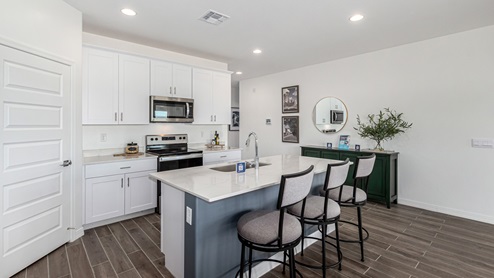 Welcome to Sahuarita Acres, where new homes by D.R. Horton offer the perfect blend of space, comfort, and modern convenience on expansive one-acre lots in the tranquil town of Sahuarita, Arizona. This unique community is designed for those who appreciate the luxury of space, with homes ranging from 1,900 to 2,600 square feet, each thoughtfully crafted with high-end finishes and features that cater to contemporary living. Sahuarita Acres provides a serene living experience with its spacious lots, perfect for creating your dream outdoor space. Whether you’re looking to park your RV, install a pool, or simply enjoy a large backyard, these one-acre homesites offer endless possibilities. The community also features walking trails that wind through the picturesque landscape, making it easy to enjoy the natural beauty of Sahuarita. Each home in Sahuarita Acres comes equipped with D.R. Horton’s Home is Connected® Smart Home package that includes a smart thermostat, video doorbell, keyless entry, a Wi-Fi-enabled garage door opener and more, ensuring that modern technology is at your fingertips. These new homes also new feature spray foam insulation for enhanced energy efficiency, RV parking with 30’ driveways, and three-car garages. Inside, you’ll find luxurious quartz countertops in the kitchens and bathrooms, 42” upper cabinets, dazzling wood-look tile flooring with thick 4 ¼ baseboards, and stainless steel appliances. These homes are also designed with energy efficiency in mind, meeting the stringent DOE Zero Energy Ready Home standards. This means your home is built to be so energy-efficient that a renewable energy system could offset most or all of the home's annual energy use, ensuring long-term savings and environmental benefits. Residents of Sahuarita Acres benefit from the peaceful, small-town charm of Sahuarita while still enjoying easy access to urban amenities. The community is just 30 minutes from downtown Tucson and only 15 miles from Davis-Monthan Air Force Base, making it an ideal location for those commuting to the city. Nearby, the Rancho Sahuarita shopping center offers a variety of dining and shopping options, including Fry’s, Dunkin’ Donuts, Starbucks, and more. Families will appreciate the excellent schools in the Sahuarita Unified School District, with Anza Trail Elementary, Anza Trail Middle School, and Walden Grove High School all located nearby. The community is also close to the popular Sahuarita Lake Park, which offers fishing, boating, and walking trails, providing ample opportunities for outdoor recreation. In addition to its scenic beauty and spacious homesites, Sahuarita Acres is close to several local attractions, including the Titan Missile Museum, Desert Diamond Casino, and the scenic Madera Canyon. Whether you’re looking to explore the outdoors or enjoy the quiet, laid-back vibe of Sahuarita, Sahuarita Acres offers a lifestyle that’s hard to match. Come home to Sahuarita Acres, where the perfect combination of space, luxury, and convenience awaits. Embrace the essence of Arizona living in this extraordinary community.