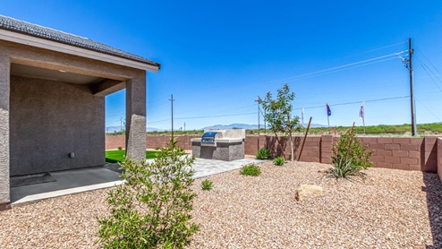 Welcome to Sahuarita Acres, where new homes by D.R. Horton offer the perfect blend of space, comfort, and modern convenience on expansive one-acre lots in the tranquil town of Sahuarita, Arizona. This unique community is designed for those who appreciate the luxury of space, with homes ranging from 1,900 to 2,600 square feet, each thoughtfully crafted with high-end finishes and features that cater to contemporary living. Sahuarita Acres provides a serene living experience with its spacious lots, perfect for creating your dream outdoor space. Whether you’re looking to park your RV, install a pool, or simply enjoy a large backyard, these one-acre homesites offer endless possibilities. The community also features walking trails that wind through the picturesque landscape, making it easy to enjoy the natural beauty of Sahuarita. Each home in Sahuarita Acres comes equipped with D.R. Horton’s Home is Connected® Smart Home package that includes a smart thermostat, video doorbell, keyless entry, a Wi-Fi-enabled garage door opener and more, ensuring that modern technology is at your fingertips. These new homes also new feature spray foam insulation for enhanced energy efficiency, RV parking with 30’ driveways, and three-car garages. Inside, you’ll find luxurious quartz countertops in the kitchens and bathrooms, 42” upper cabinets, dazzling wood-look tile flooring with thick 4 ¼ baseboards, and stainless steel appliances. These homes are also designed with energy efficiency in mind, meeting the stringent DOE Zero Energy Ready Home standards. This means your home is built to be so energy-efficient that a renewable energy system could offset most or all of the home's annual energy use, ensuring long-term savings and environmental benefits. Residents of Sahuarita Acres benefit from the peaceful, small-town charm of Sahuarita while still enjoying easy access to urban amenities. The community is just 30 minutes from downtown Tucson and only 15 miles from Davis-Monthan Air Force Base, making it an ideal location for those commuting to the city. Nearby, the Rancho Sahuarita shopping center offers a variety of dining and shopping options, including Fry’s, Dunkin’ Donuts, Starbucks, and more. Families will appreciate the excellent schools in the Sahuarita Unified School District, with Anza Trail Elementary, Anza Trail Middle School, and Walden Grove High School all located nearby. The community is also close to the popular Sahuarita Lake Park, which offers fishing, boating, and walking trails, providing ample opportunities for outdoor recreation. In addition to its scenic beauty and spacious homesites, Sahuarita Acres is close to several local attractions, including the Titan Missile Museum, Desert Diamond Casino, and the scenic Madera Canyon. Whether you’re looking to explore the outdoors or enjoy the quiet, laid-back vibe of Sahuarita, Sahuarita Acres offers a lifestyle that’s hard to match. Come home to Sahuarita Acres, where the perfect combination of space, luxury, and convenience awaits. Embrace the essence of Arizona living in this extraordinary community.