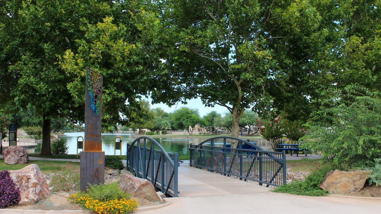 Welcome to The Madera, a beautifully expansive single-story new home nestled in the peaceful Sahuarita Acres community. With 2,131 square feet of thoughtfully arranged living space, this residence offers five bedrooms and three bathrooms, making it an exceptional choice for those who seek both comfort and versatility.  The journey through The Madera begins as you step onto the inviting front porch and enter through the welcoming foyer. The open layout immediately draws you into the spacious great room, where large windows allow natural light to fill the space, creating a warm and inviting atmosphere. The adjacent dining area flows seamlessly into the kitchen, which features a central island, quartz countertops, and 42” upper cabinets for ample storage. A walk-in pantry ensures that the kitchen remains both functional and stylish.  The Madera’s floor plan is designed with privacy in mind. The primary bedroom, located in a separate wing of the home, offers a large walk-in closet and an en-suite bathroom with dual sinks and a luxurious shower. On the opposite side of the home, four additional bedrooms are well-positioned to offer both privacy and easy access to the other two bathrooms, making this layout perfect for families or hosting guests.  One of the standout features of The Madera is its adaptability. The three-car garage and expansive near one-acre lots provide plenty of room for parking, storage, and outdoor activities, whether you envision creating a lush garden, installing a pool, or simply enjoying the vast open space.  For those who value modern conveniences, The Madera is equipped with D.R. Horton’s Home is Connected® Smart Home package, which includes a smart thermostat, video doorbell, keyless entry, a Wi-Fi-enabled garage door opener and more. Additionally, the home is built with energy efficiency in mind, featuring spray foam insulation and meeting DOE Zero Energy Ready Home standards, ensuring long-term savings and environmental benefits.  Located within the serene and spacious Sahuarita Acres community, residents of The Madera enjoy the perfect blend of small-town charm and modern amenities. With easy access to urban conveniences, excellent schools, and outdoor recreation opportunities, The Madera offers a lifestyle that embraces the essence of Arizona living.